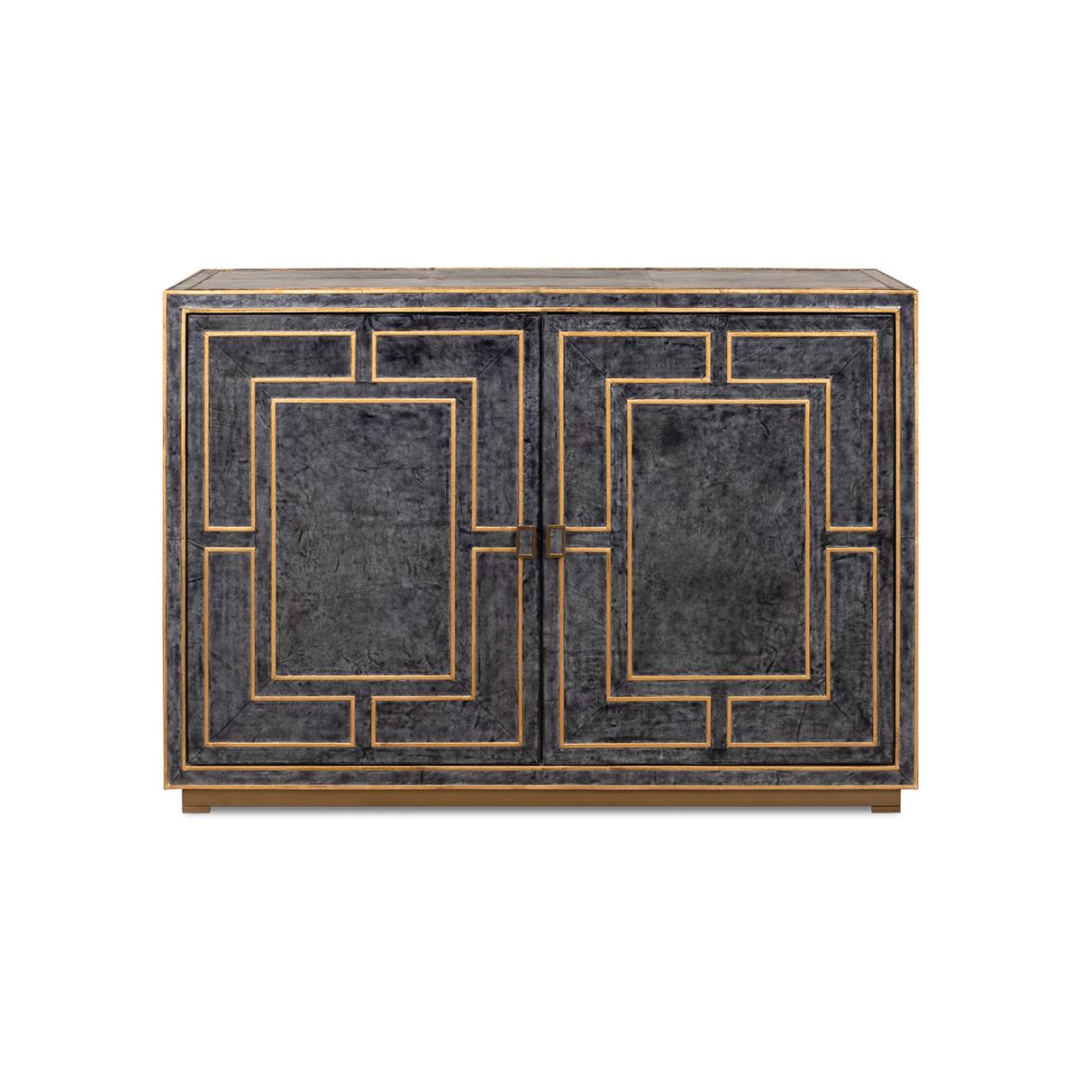 Modern leather cabinet, the two-door cabinet with gold piping in a geometric design, with a natural wood interior raised on a squared base.

Dimensions: 53