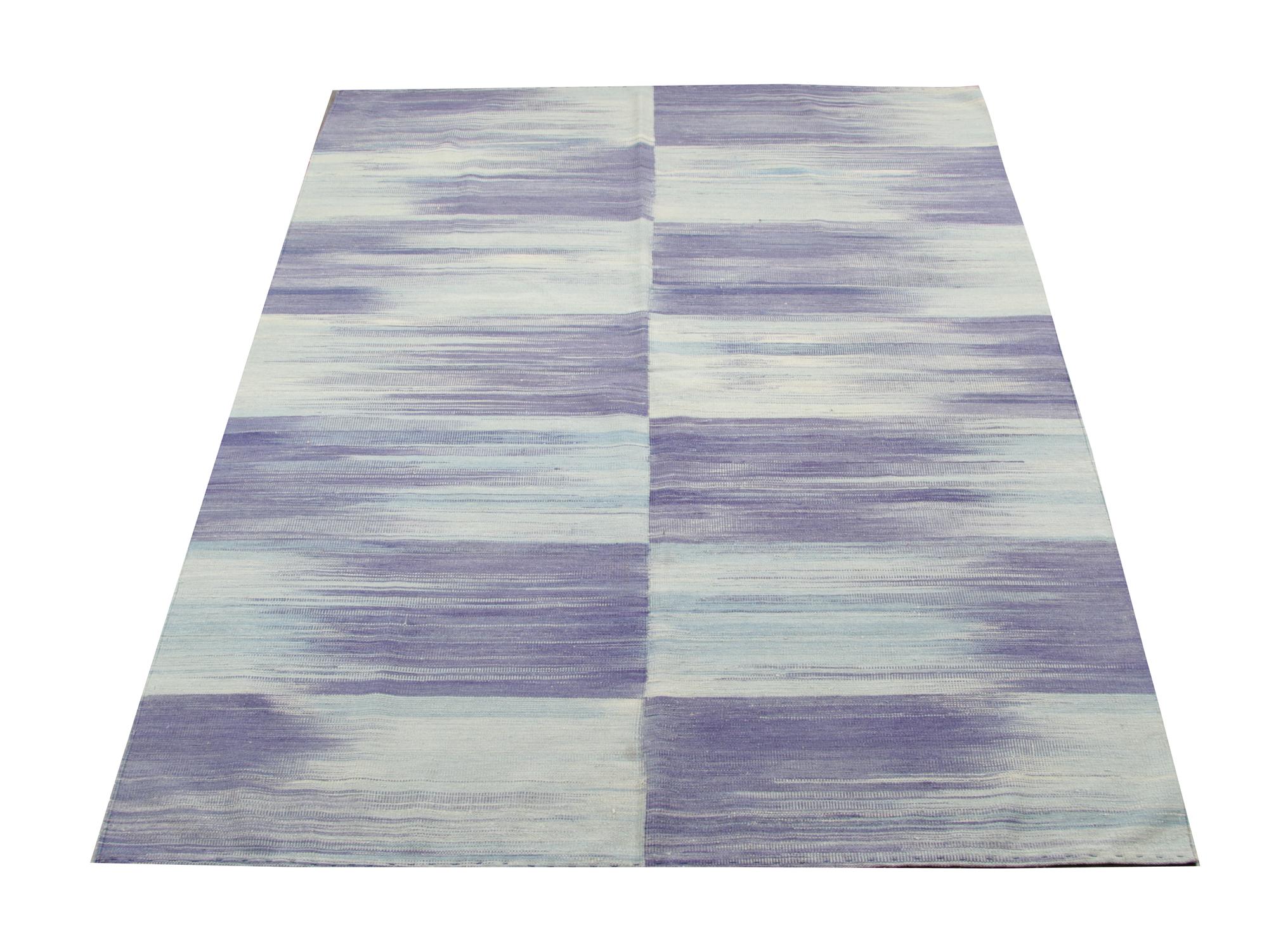 The flat wave rug features a fantastic blue brushed stripe design. The geometric rug has been handmade in the North of Afghanistan using locally hand-spun wool and cotton. The quality of the woven rug is enhanced by using only vegetable dyes for the