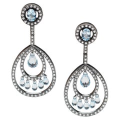 Boucles d'oreilles pendantes modernes en or oxydé, diamants briolette et topaze bleue