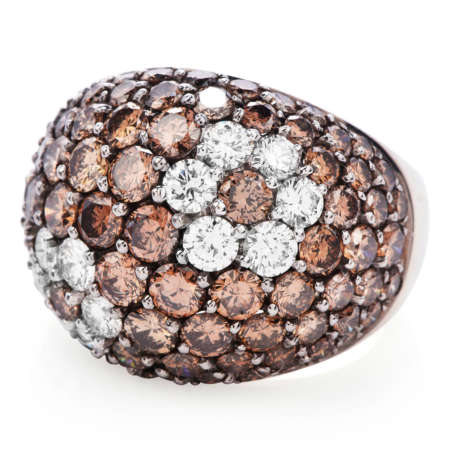 Exquisite Botanical-Inspired Fancy Wide Dome Cocktail Ring is adorned by

83 Natural Fancy Brown Orange Round Cut Diamonds expertly placed

throughout the Dome shape band.  A total 7.00-carat weight,  VS-SI Clarity and 

12 Vibrant, Genuine Round