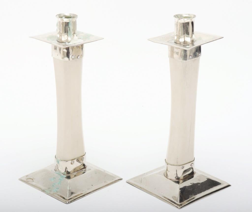 Pair of modern candlesticks with bone standards and chromed metal mounts. Property from the Estate of designer, model, television host, and business woman, Nina Griscom.

Dealer: S138XX