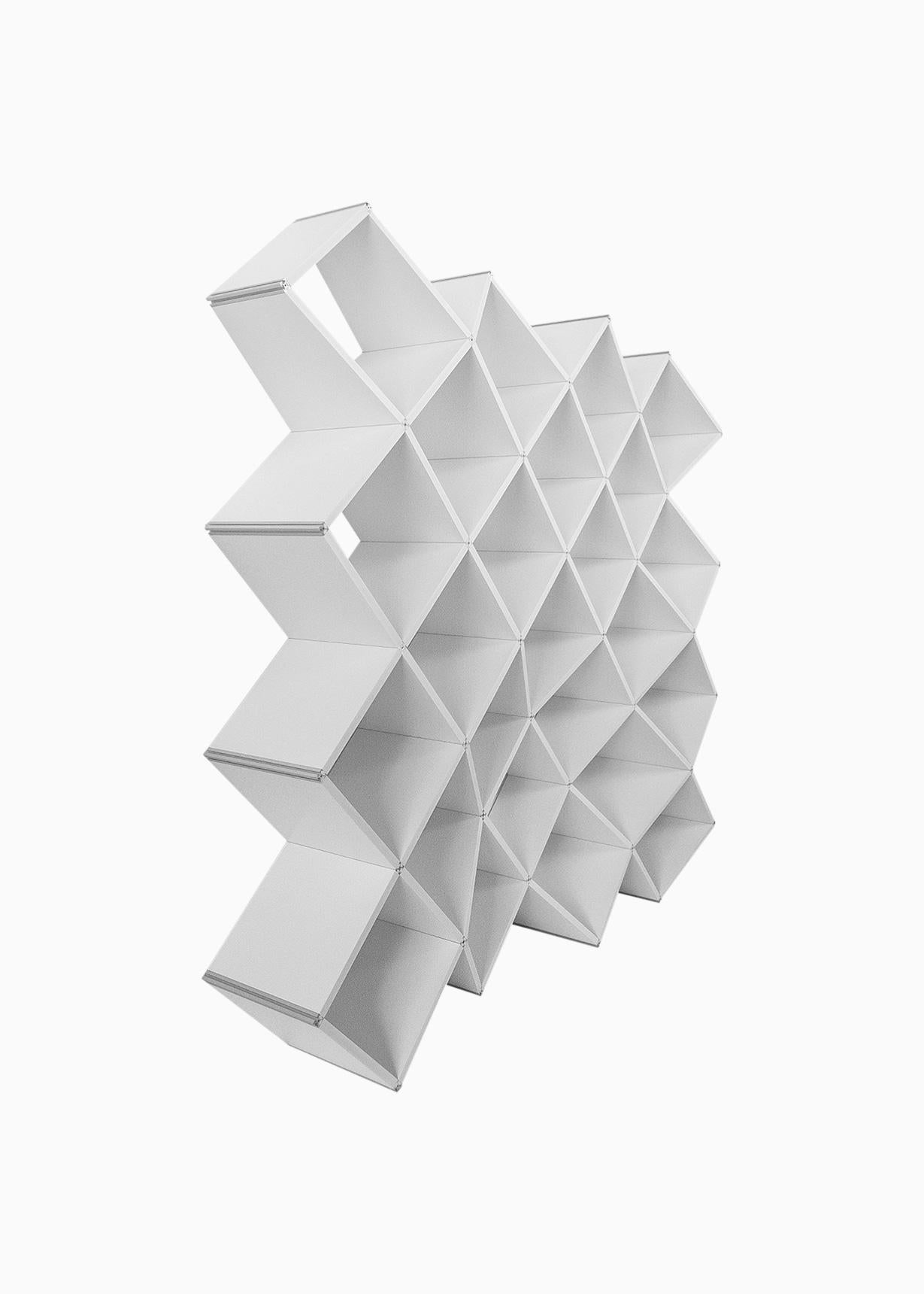 X.me is a modern bookcase, designed by Salvator-John A. Liotta (LAPS Architecture) and manufactured by MYOP, with PVC foam shelves connected by a single extruded aluminum connector.
X.me fits to every types of space, wrapping them. The X is a sign,