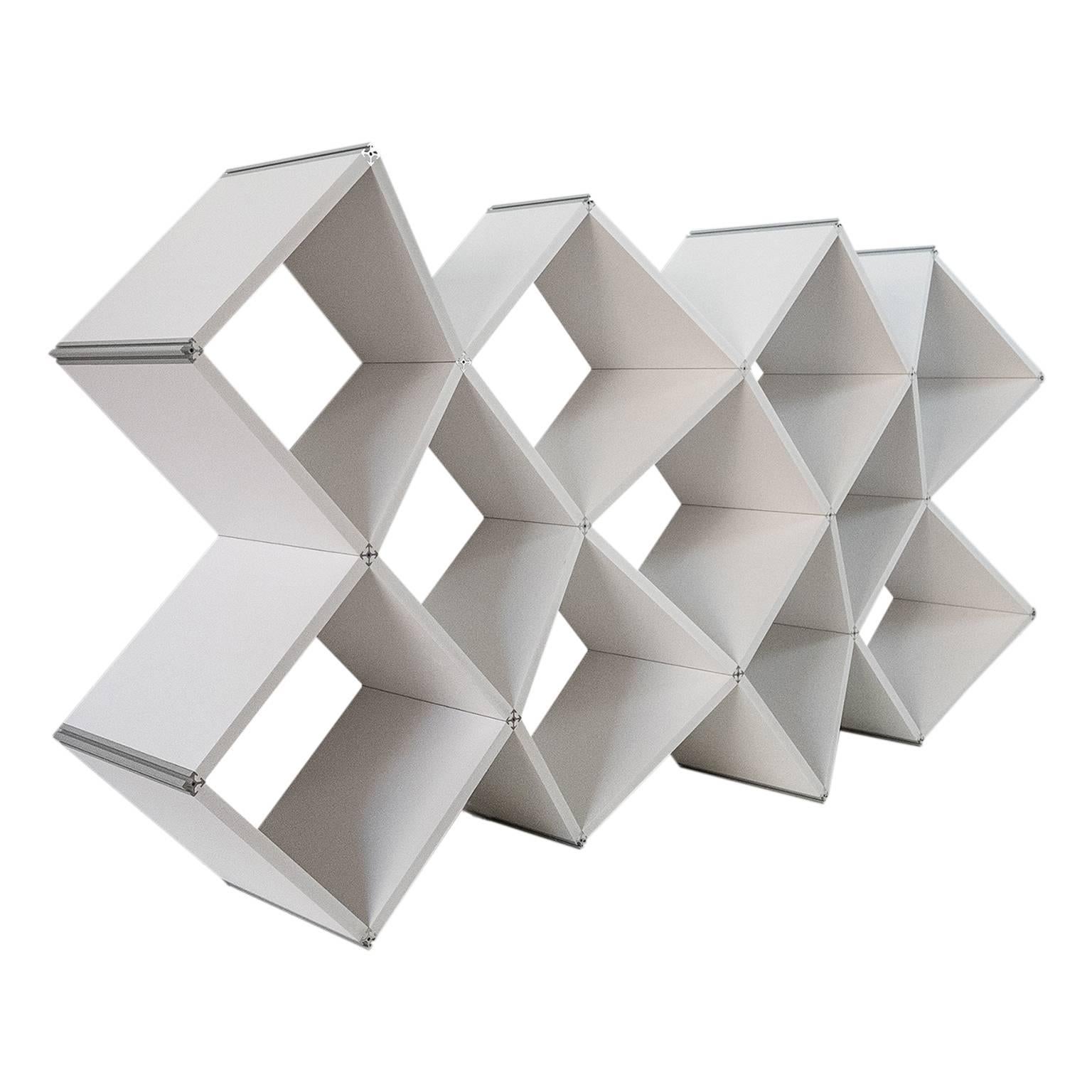 X.me is a modern bookcase, designed by Salvator-John A. Liotta (LAPS Architecture) and manufactured by MYOP, with PVC foam shelves connected by a single extruded aluminum connector.
X.me fits to every types of space, wrapping them. The X is a sign,