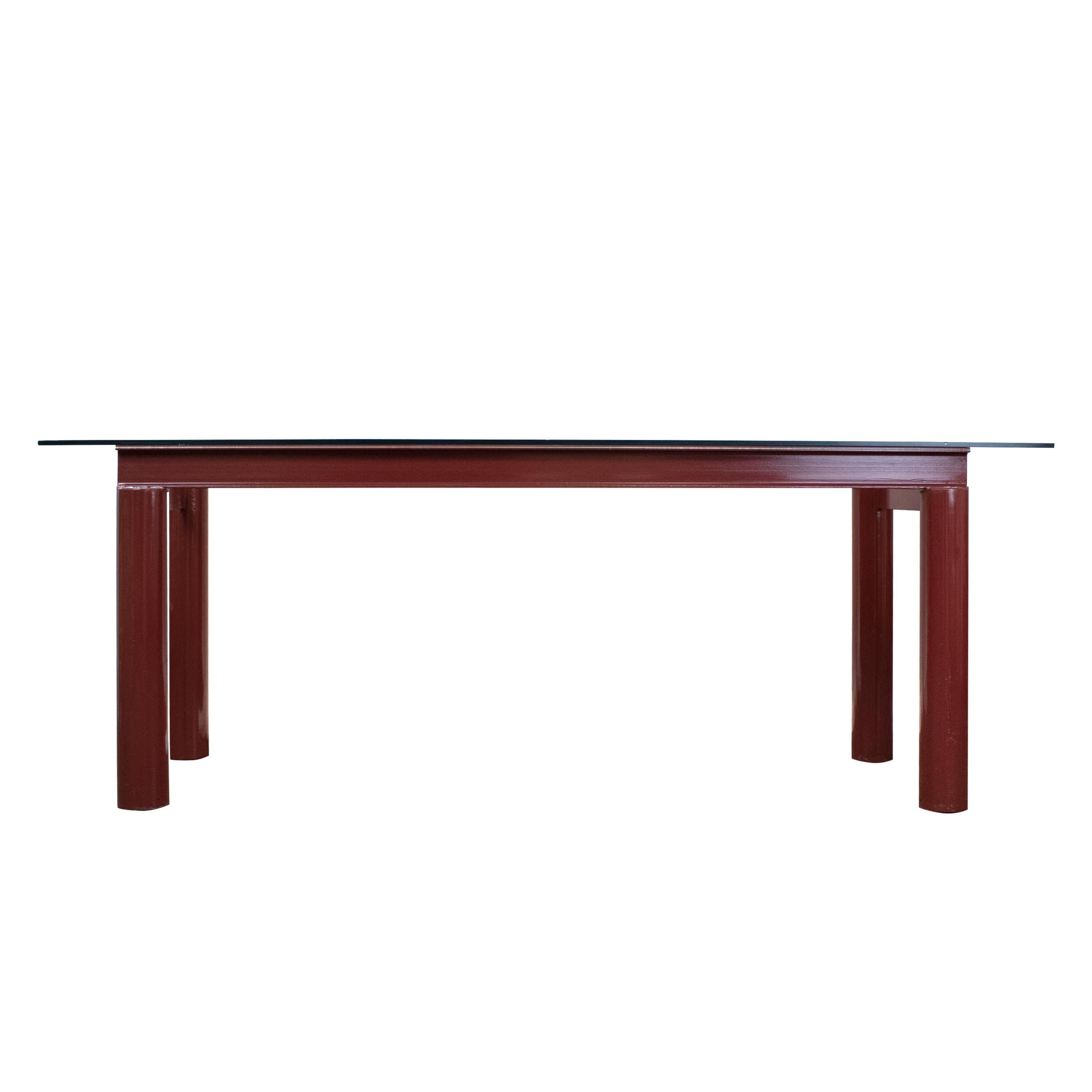 Unique Italian dining table. The table consists of an architectural steel lacquered structure and a rectangular transparent glass top.

The glass can be custom adjusted.