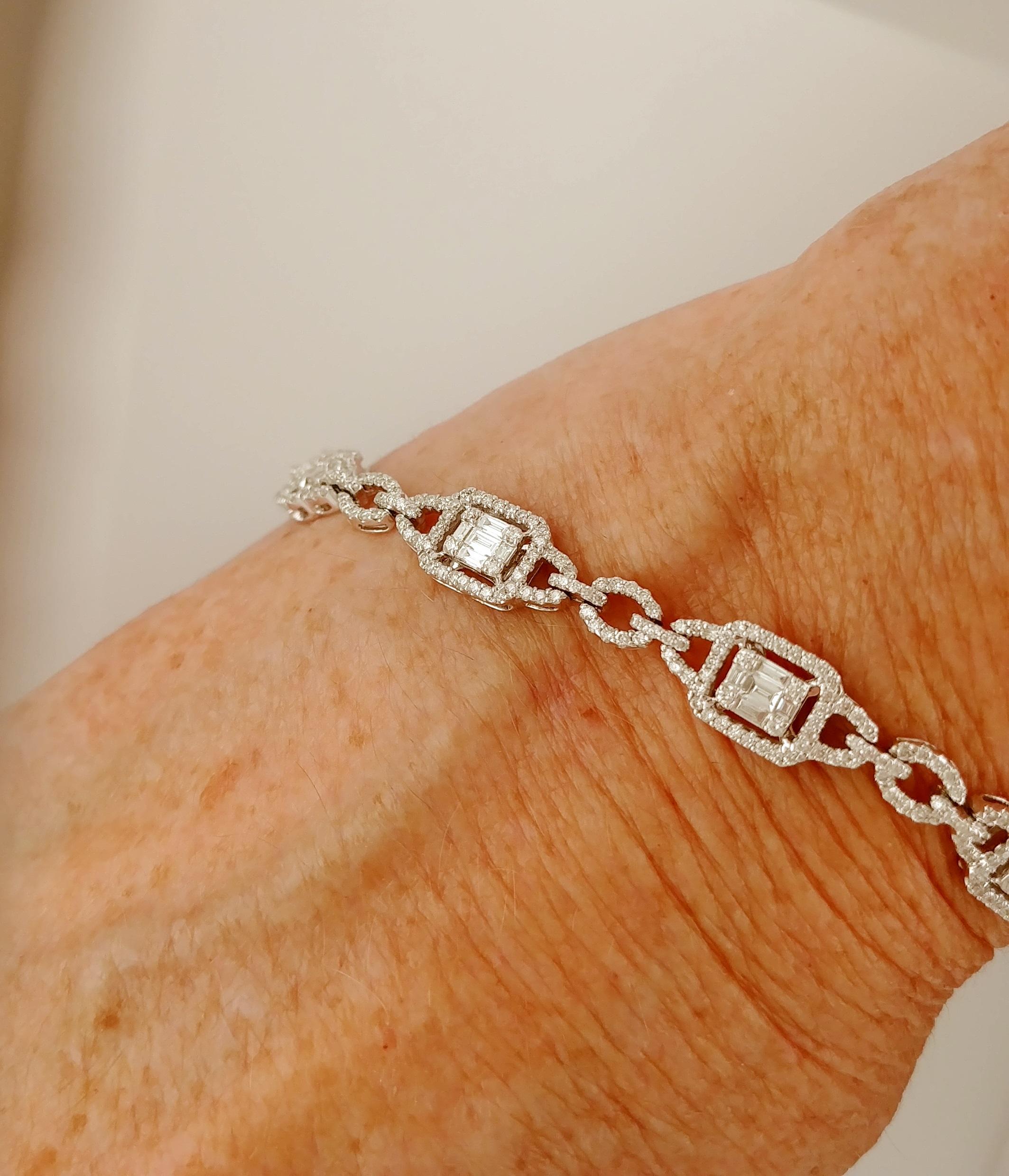 Modern Bracelet 18K White Gold with Baguette & Round Diamonds is 7 inches long. 7.75mm wide and weighs 13.4 grams.   Bracelet is set with 0.85 carats total weight baguette and round brilliant cut diamonds for a delicate yet stunning presentation. 