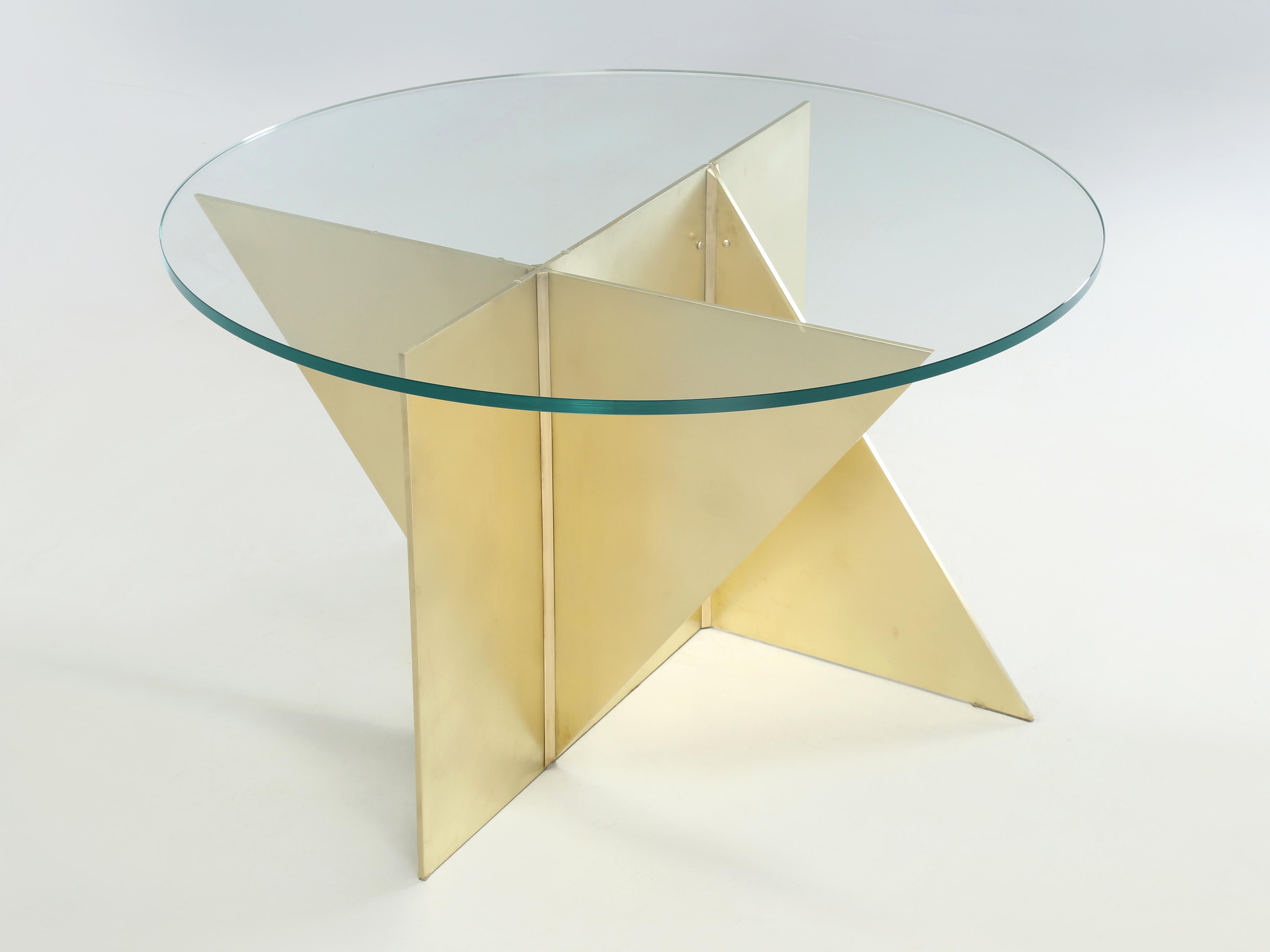 Modern Thick Solid Brass Center Hall Table or with a larger top can be used as a Dining Room Table. Currently as shown the Modern Brass Table is fitted with a thick glass and functions as a Center Hall Table, while optionally at no extra cost is an