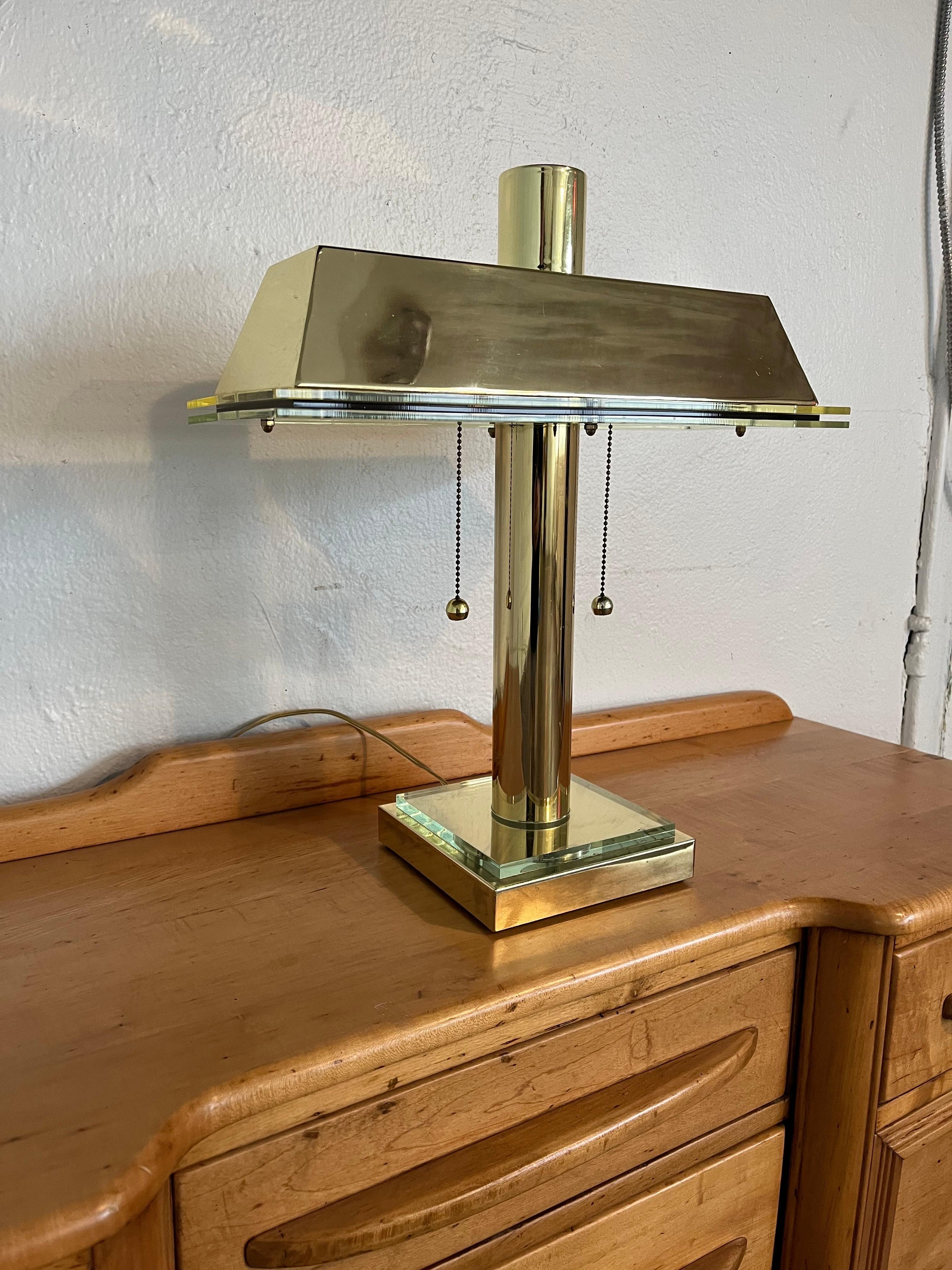 Unique and stylish modern banker or student lamp. Brass offset with lucite. Modern streamline twist on a classic. 2 bulbs individually controlled with pull chains. 