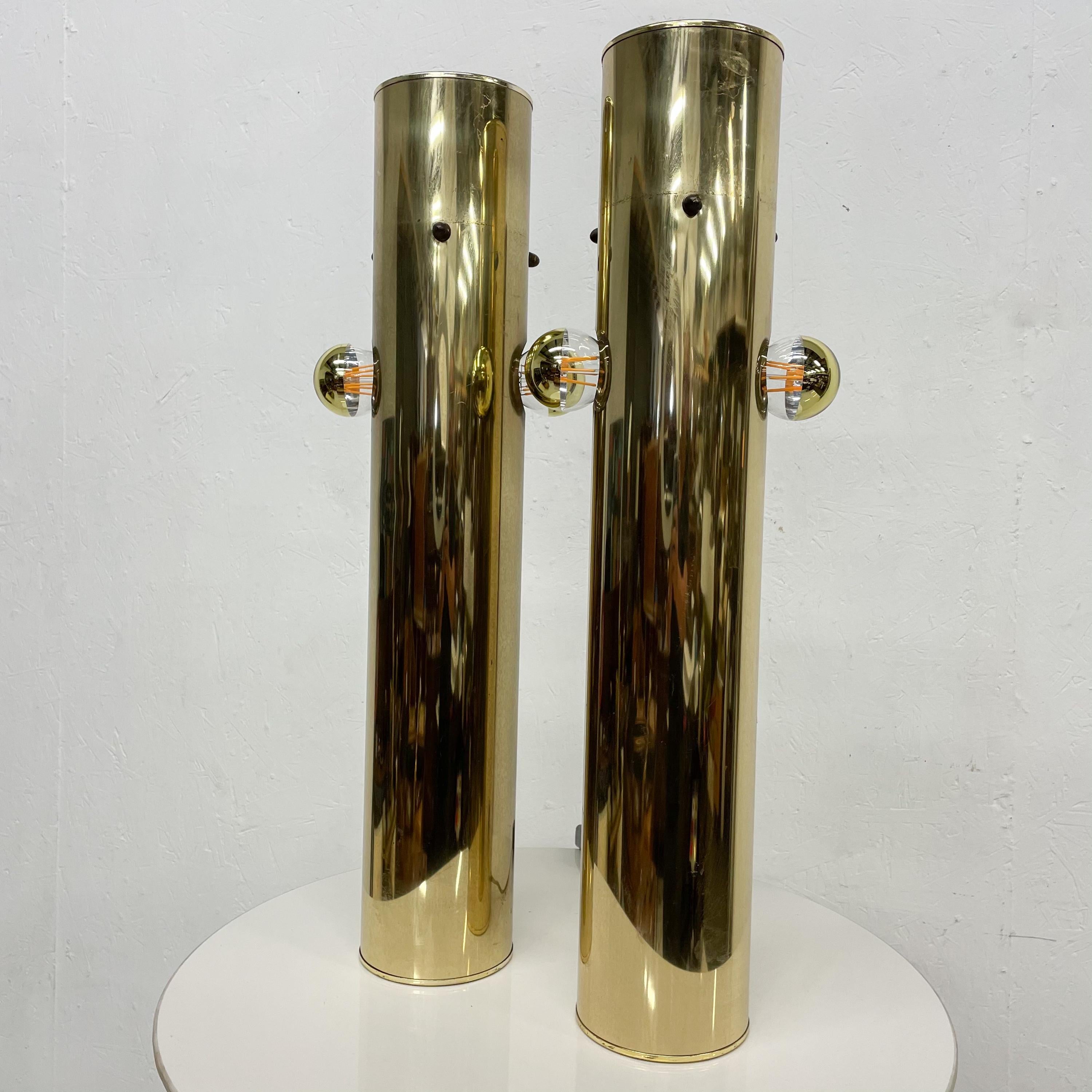 1970s Modern Brass Cylinder Table Lamp Pair Pop Art Sculptural Style of Robert Sonneman.
No verification present.
Features new cable wiring with dimmer. Includes Two Bulbs.
Original Preowned Vintage Unrestored condition. 
Scuffs and Patina on