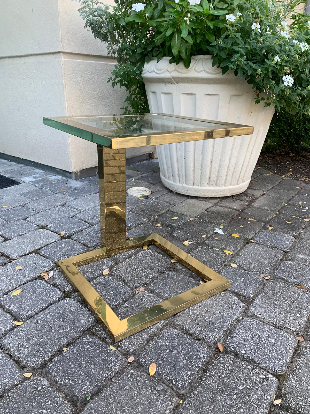 Modern brass table with glass top, circa 1970-1980s.