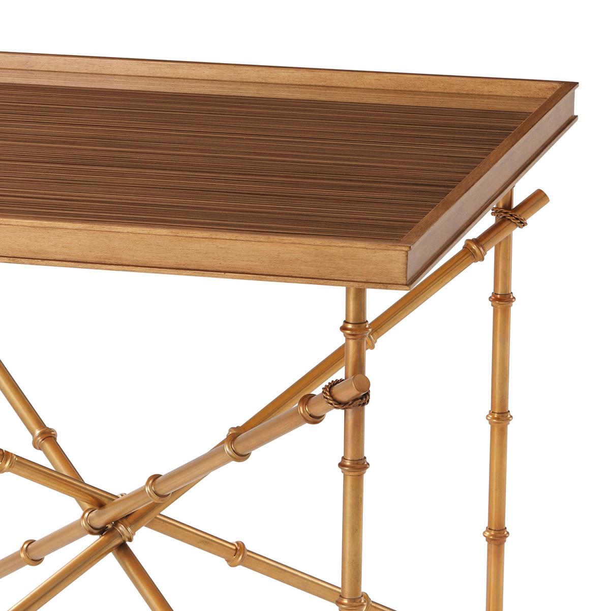 A work of art and beautiful accent table. The base is a network of faux bamboo cast in brass with brass strappings. The table top is veneered with glass overlay. An eglomise tray top completes the design. Organic and sophisticated.

Dimensions: 26
