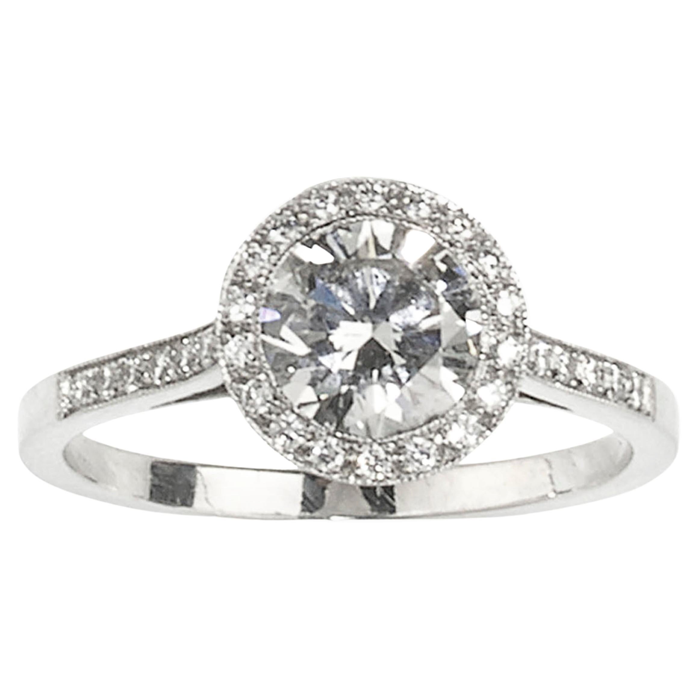 Modern Brilliant Cut Diamond and Platinum Halo Ring, 1.00 Carat For Sale