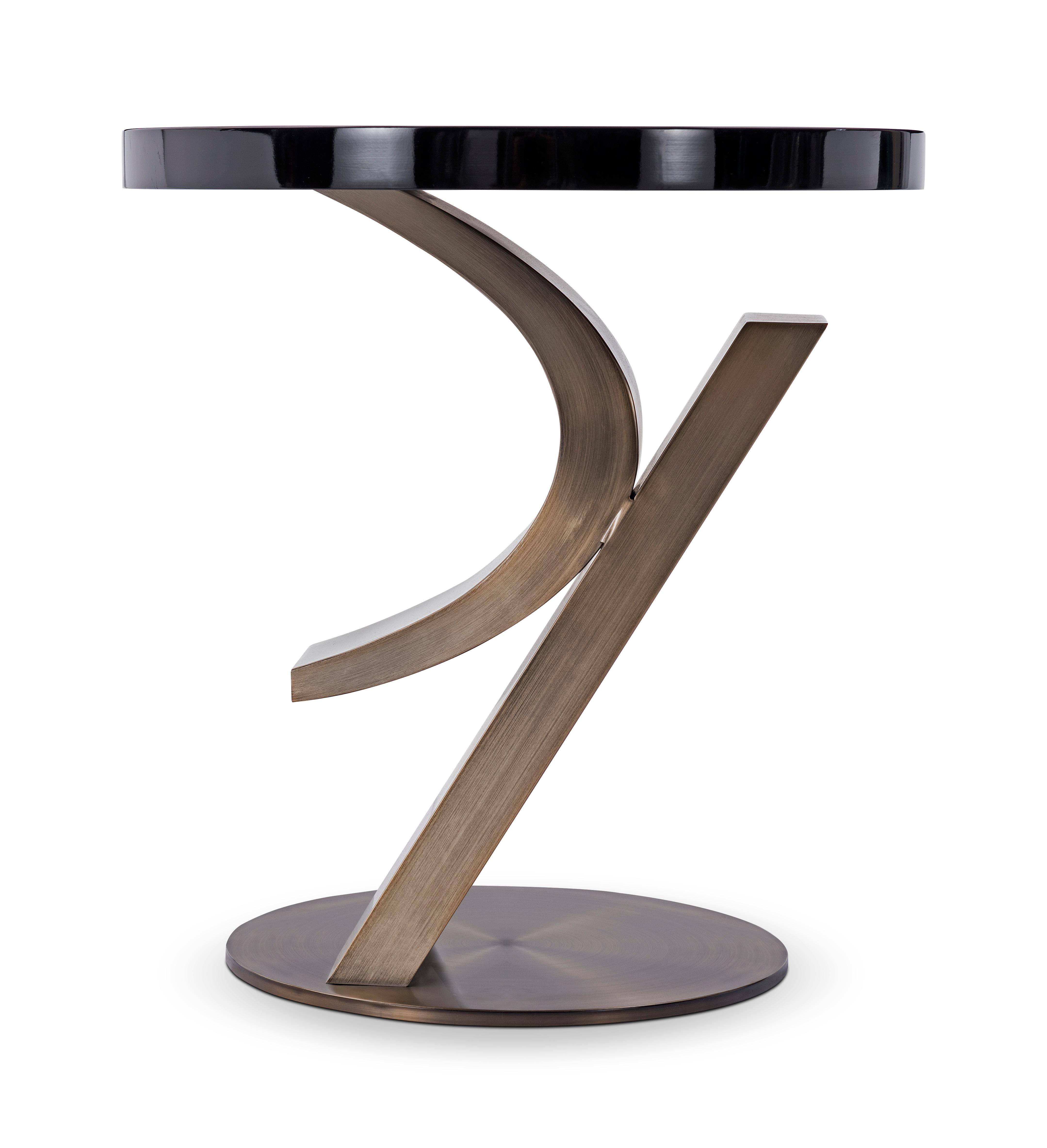 Bronze and lacquer end table designed by Greg Sheres.  Now in stock. Sophisticated original sculpture in Antiqued Bronze. The polished Black lacquer top is designed so that it appears to float in the air.  
The antiqued bronze  sculpture forms the