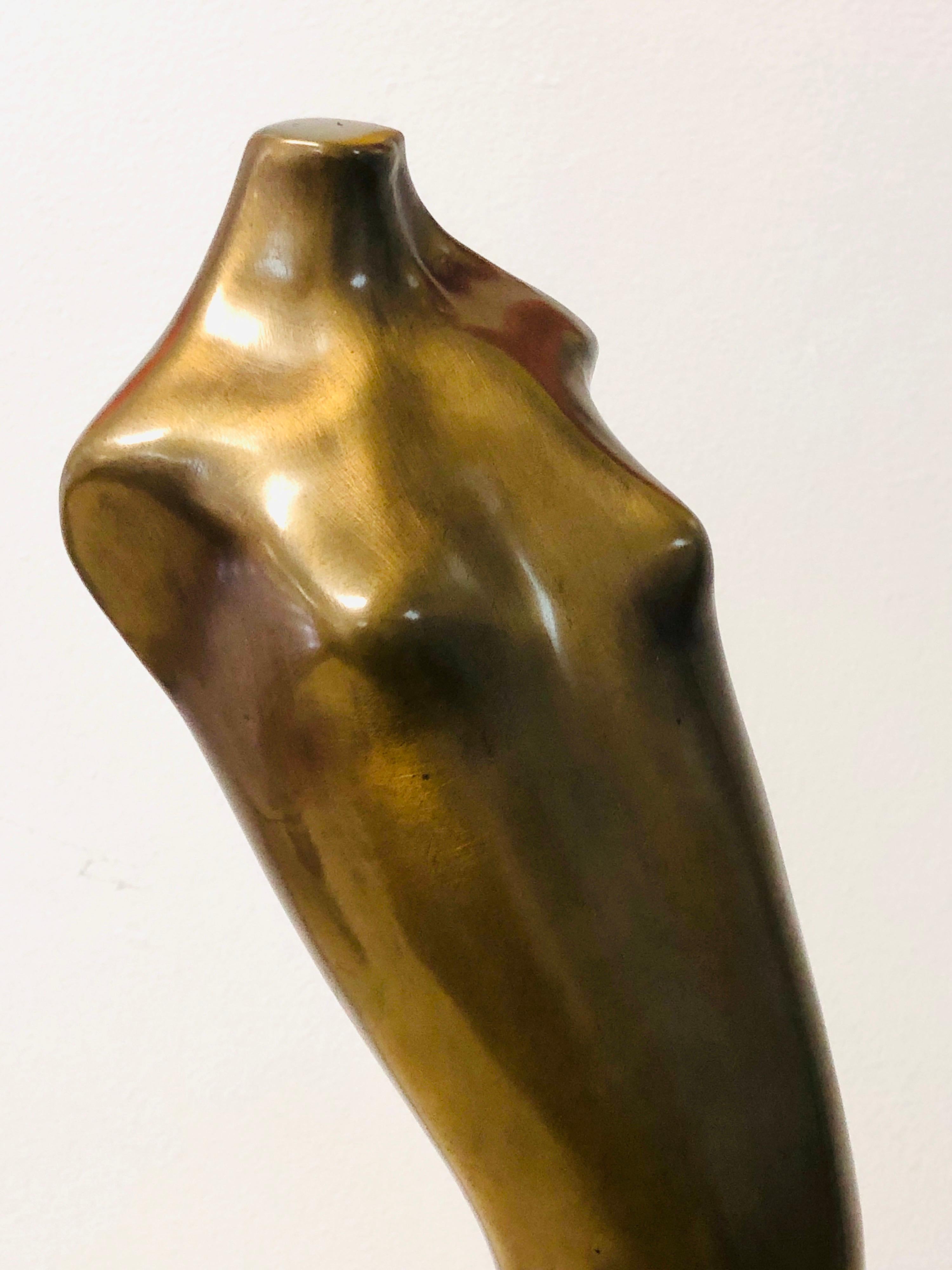 A beautiful Modernist bronze sculpture of a nude female mounted on a marble base. Measures: 4/12.
