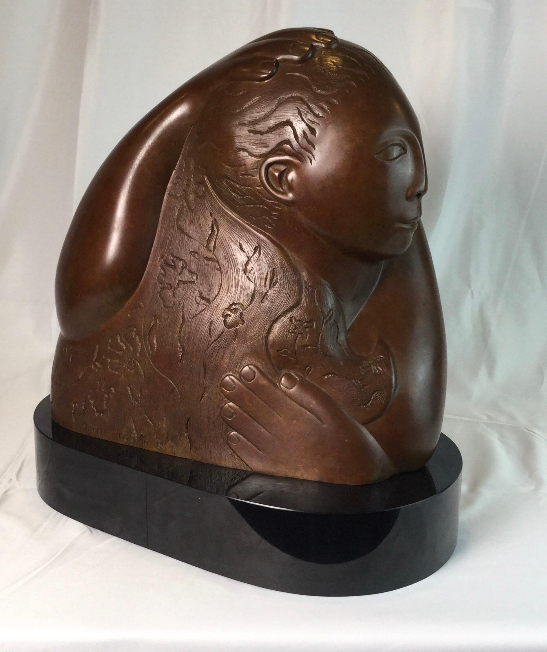 A modern bronze on black base of a stylized mother and child, signed Devorah Sperber 1993
Devorah Sperber was born in 1961 in Detroit, MI, and moved to Denver, Colorado at the age of ten, where she later graduated from the Art Institute of Colorado