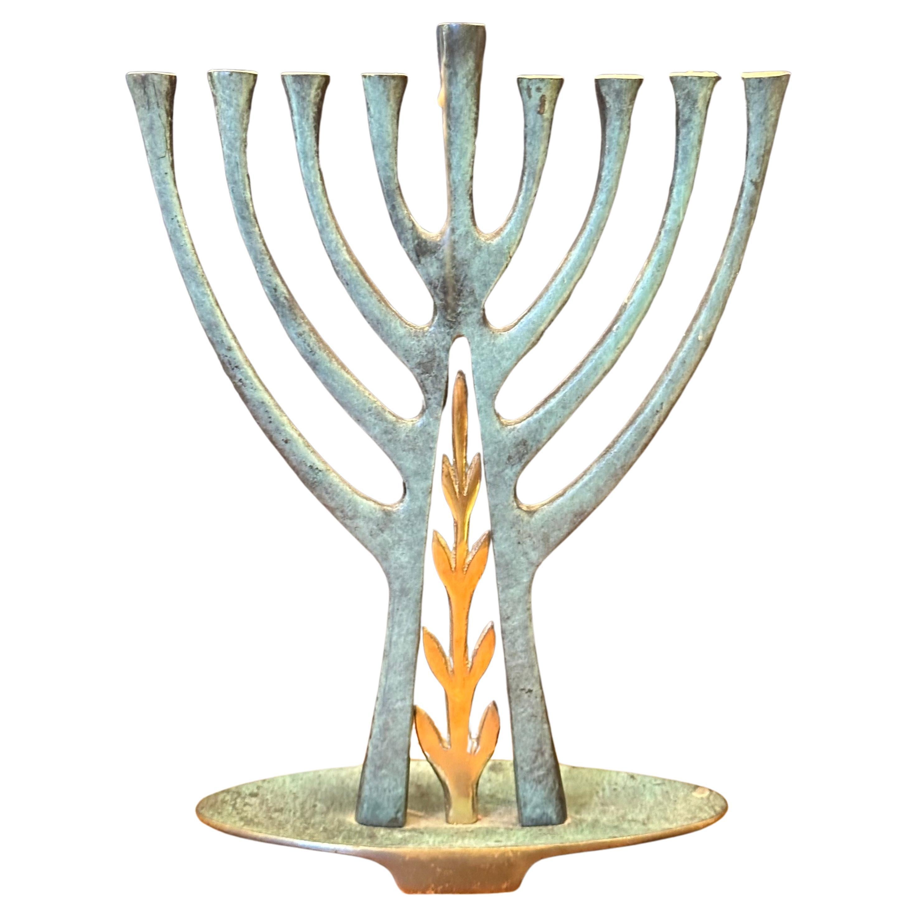 Gorgeous modern bronze verdigris menorah from Israel, circa 1980s.  The menorah measures 8