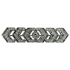 Broche moderne en or blanc 18 carats avec diamants