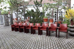 Sedie da pranzo moderne in pelle marrone cioccolato otto Tito Agnoli , 1979