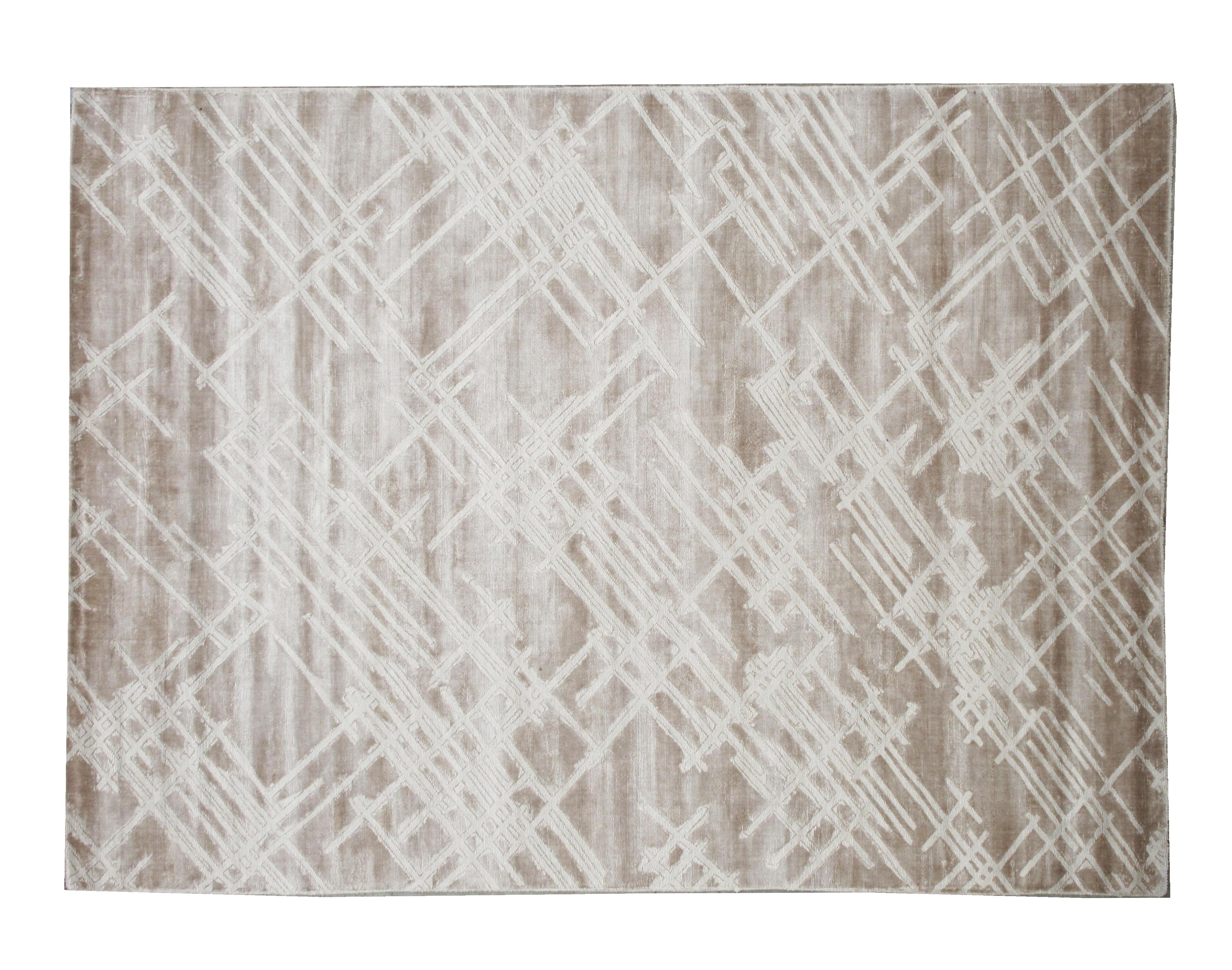 Handmade art silk pile on a cotton foundation.

Textured Design

Dimensions: 8'11