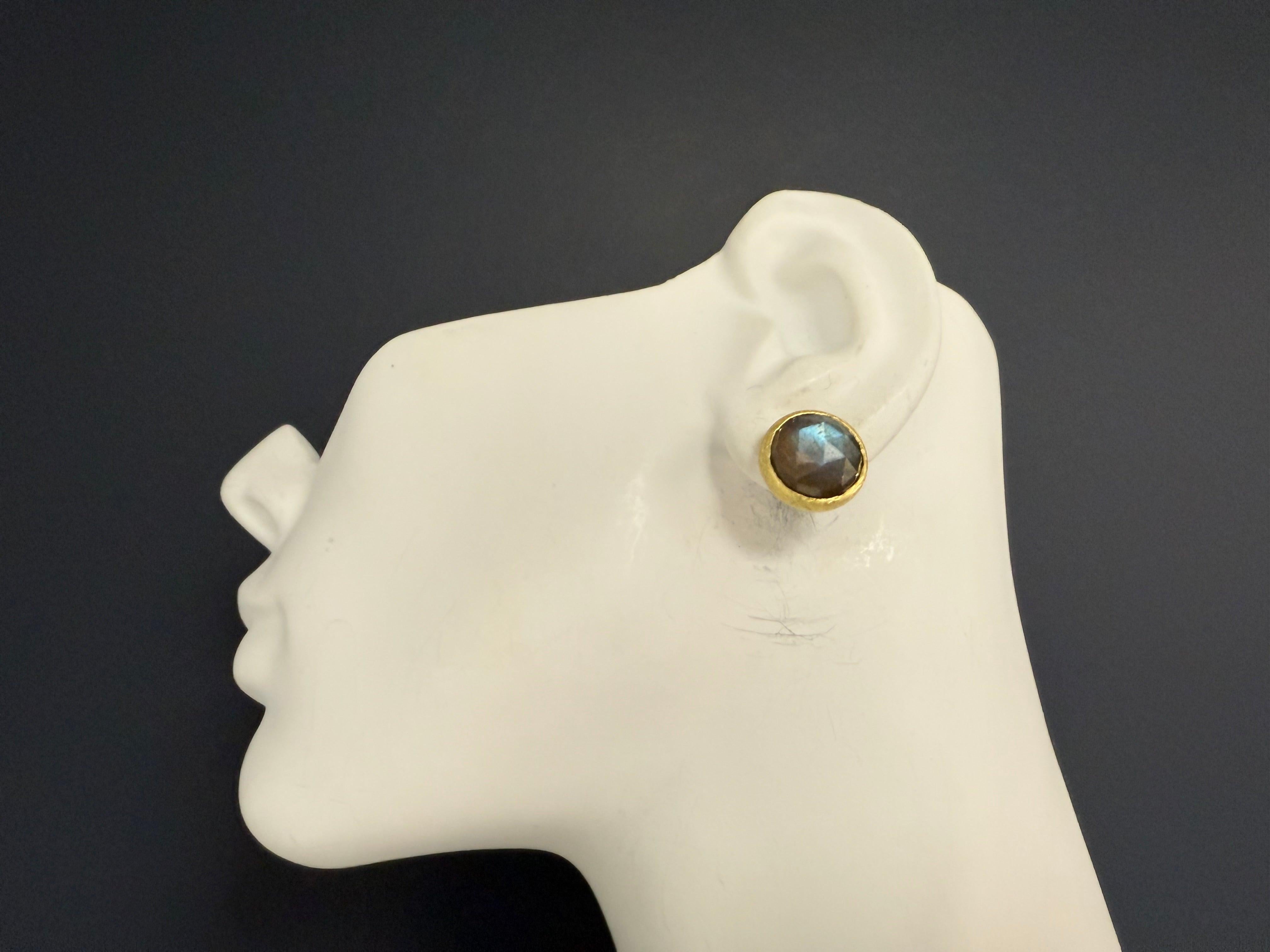 Retro yellow gold brush finish statement earrings featuring rose-cut labradorite. Measuring approximately 15 mm in diameter and weighing 9.4 grams, these earrings showcase a bright look with beautiful deep blue and green hues.
 
Three Disclaimers /