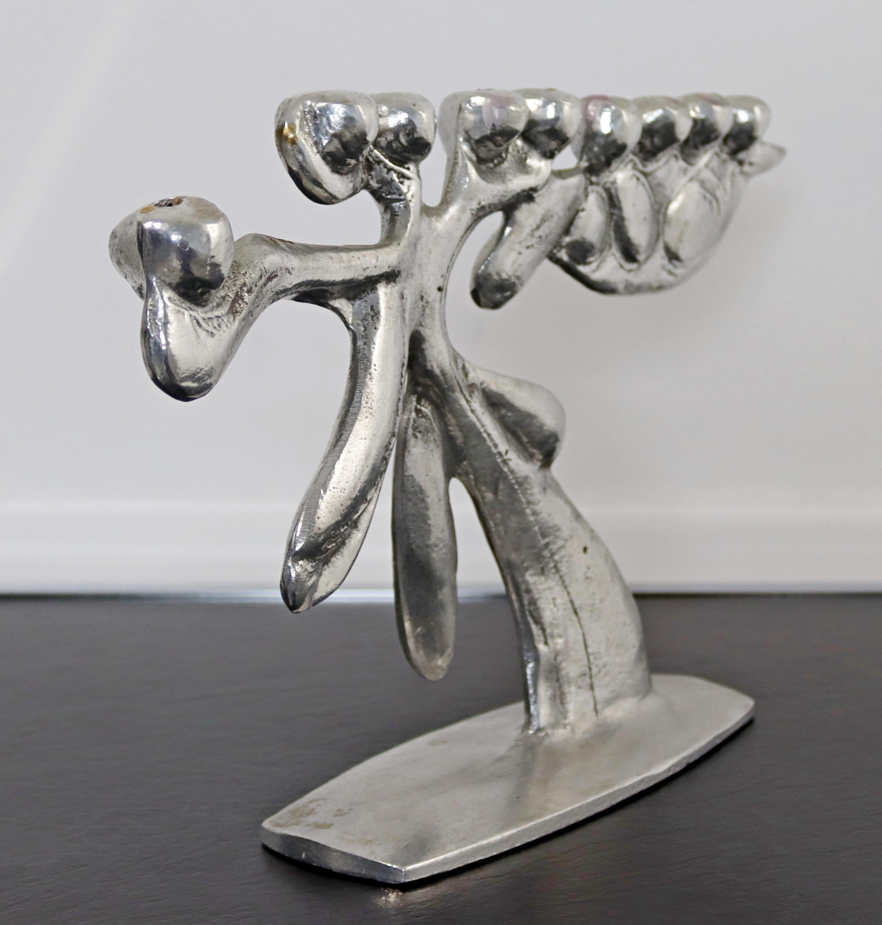 For your consideration is a marvelous, cast aluminum menorah or candelabra, signed by Donald Drumm, circa the 1960s. In excellent vintage condition. The dimensions are 15