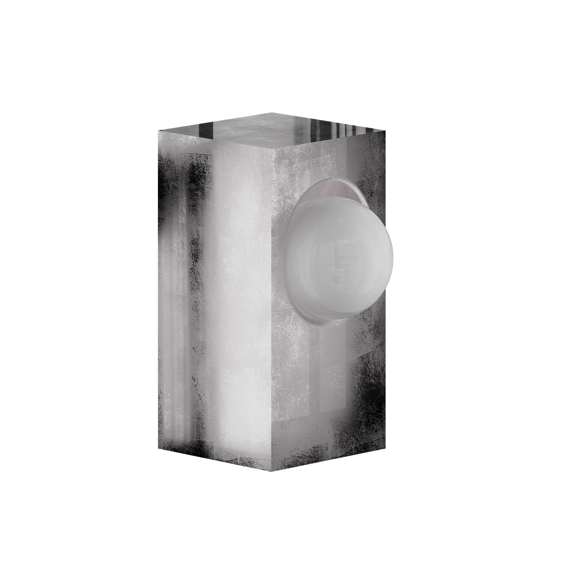 Modern Brutalist Metalic Table Lamp Geometric Silver Leaf Globe in White Glass 
The Icaro Table Lamp Silver is a bold expression of brutalist and contemporary design. Its unconventional form challenges traditional aesthetics, resulting in a