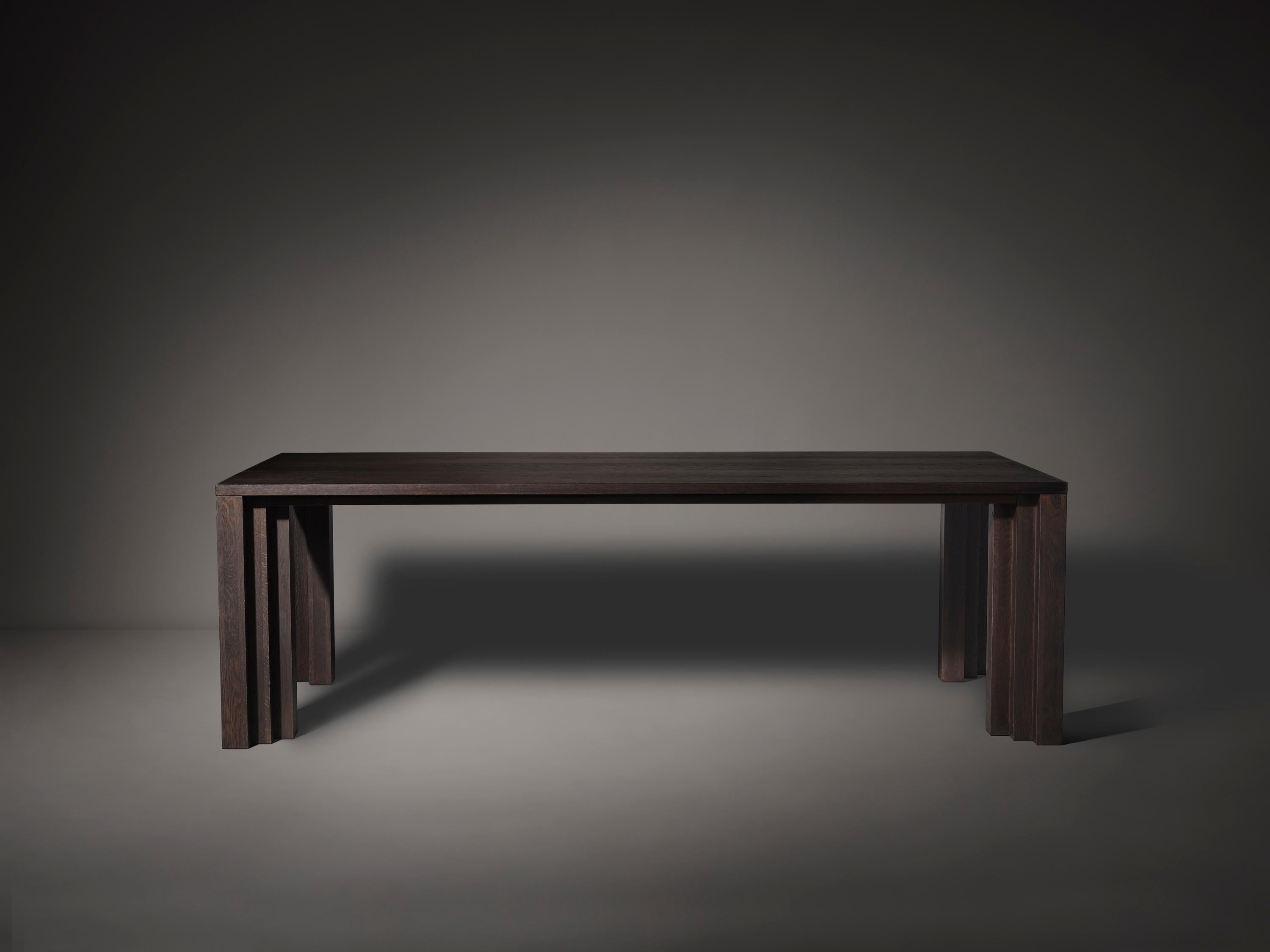 The Cadence Table, features a flow of volumes and shade lines in a sequence that is rhythmic and exciting. Its repetitive forms deepen the meaning of the home's altar that is the table. The table is made from solid hardwood and designed by Aad