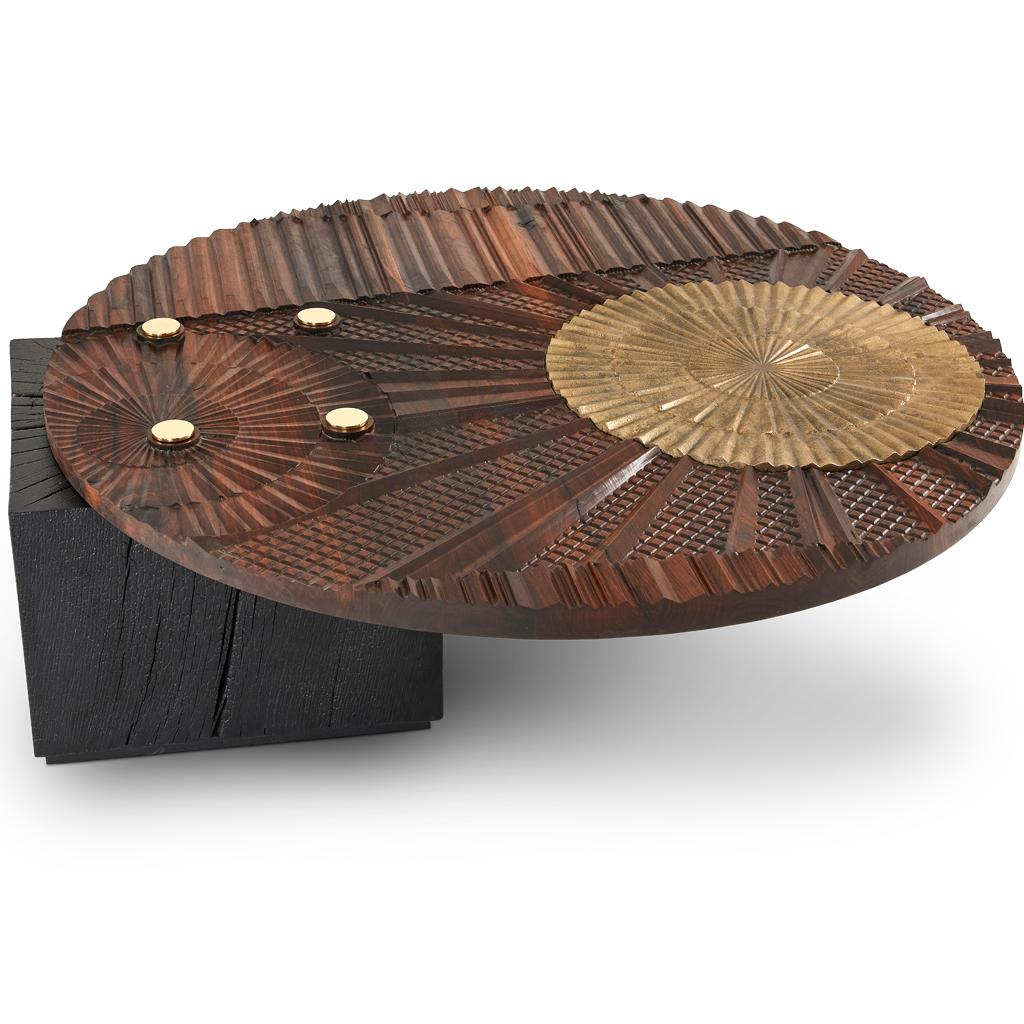 This bespoke, luxurious and incredible detailed coffee table is part of the Oromo collection designed by Egg Designs and manufactured in South Africa. 

The Oromo collection is inspired by 70's surface design, the top has a tactile, sculpted surface