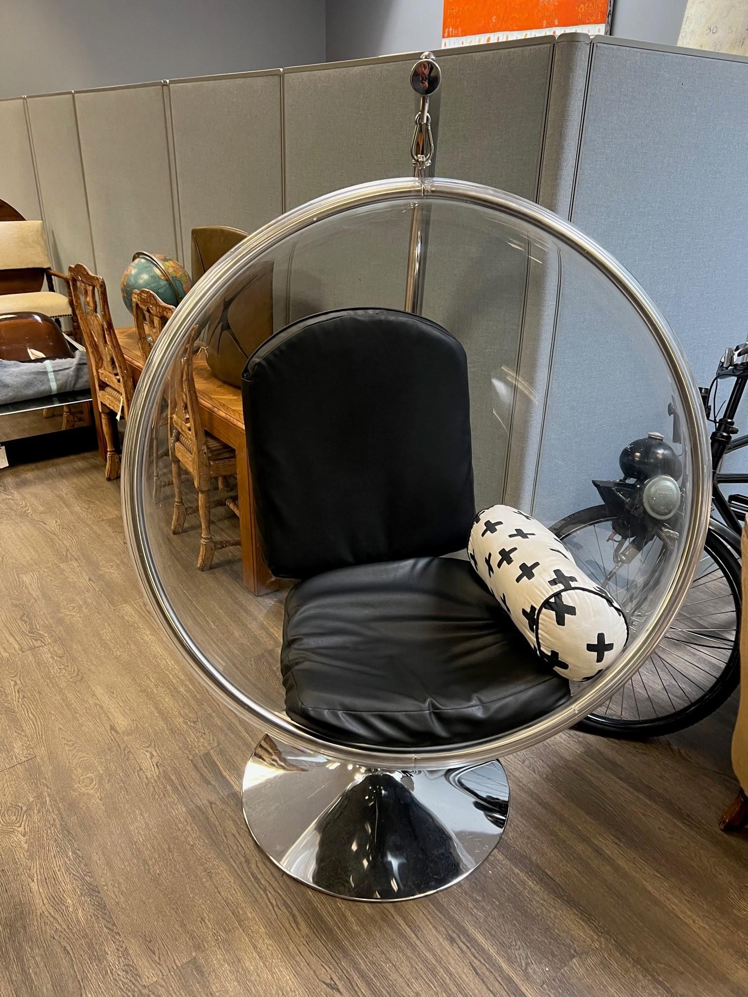 20th Century modern ball lounge chair. 

The bubble chair was originally designed in 1968 by Eero Aarnio. 

Features a modern futuristic pod hanging bubble shape made from clear acrylic with a chromed metal swivel frame. 

Accompanied with two