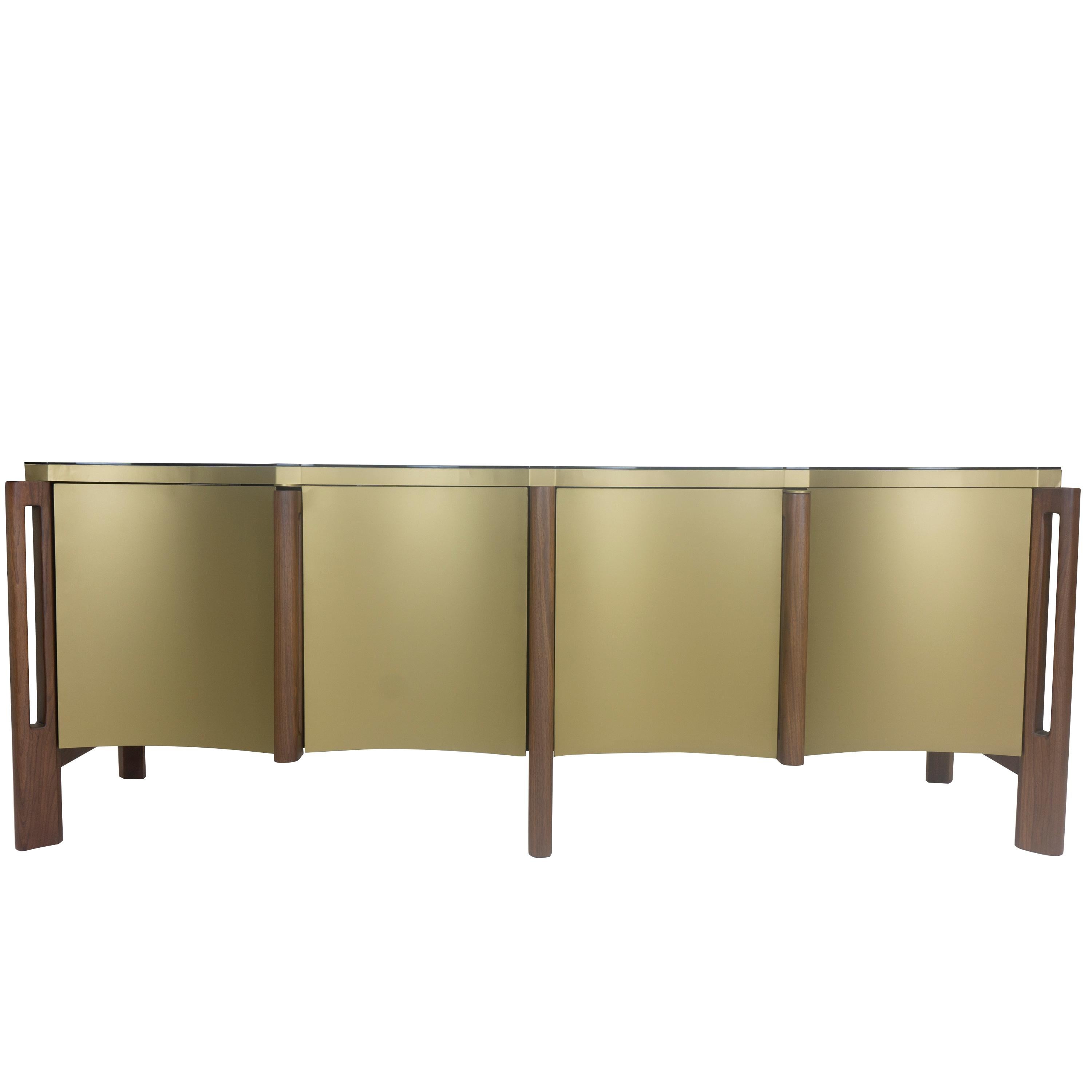Handmade in Norwalk, Connecticut USA, this buffet features a solid walnut frame, painted brass, scalloped doors and a smoked glass top.
The 1/4
