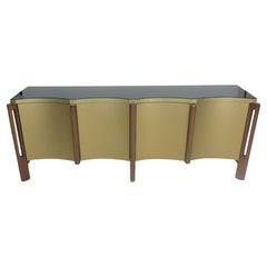 Tavolo da buffet moderno con piano in vetro e bordo smerlato