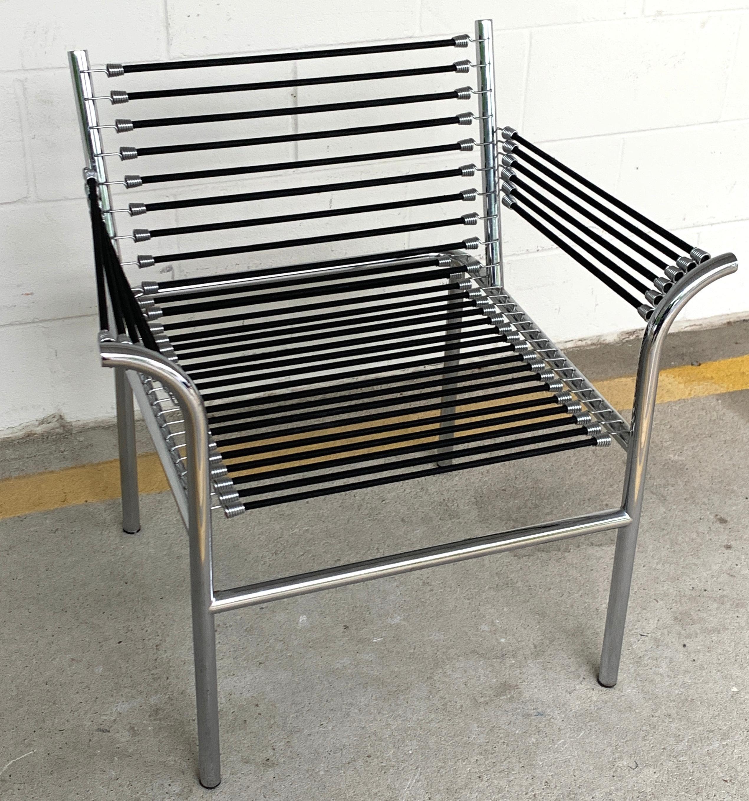 Modern bungee armchair after René Herbst, a nice vintage 1990s version, measures: arm height is 25-inches, seat height is 17-inches.