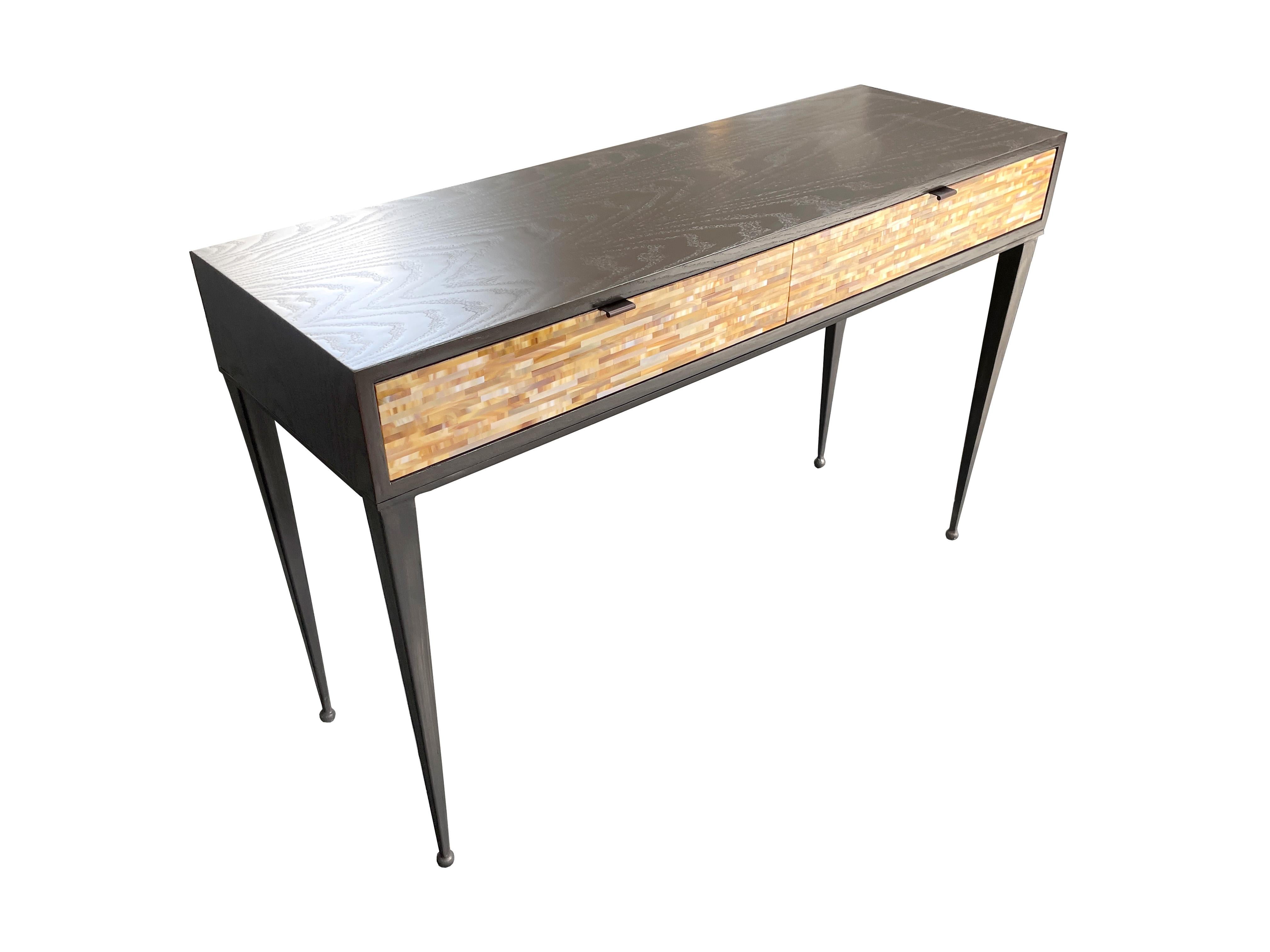 This is a very attractive and functional piece to be used as a writing desk or vanity in a modern home. Rich, warm, and modern, this desk can add sleek comfort to your space.
Handcrafted and designed by Ercole's team of mosaic artists in New York.