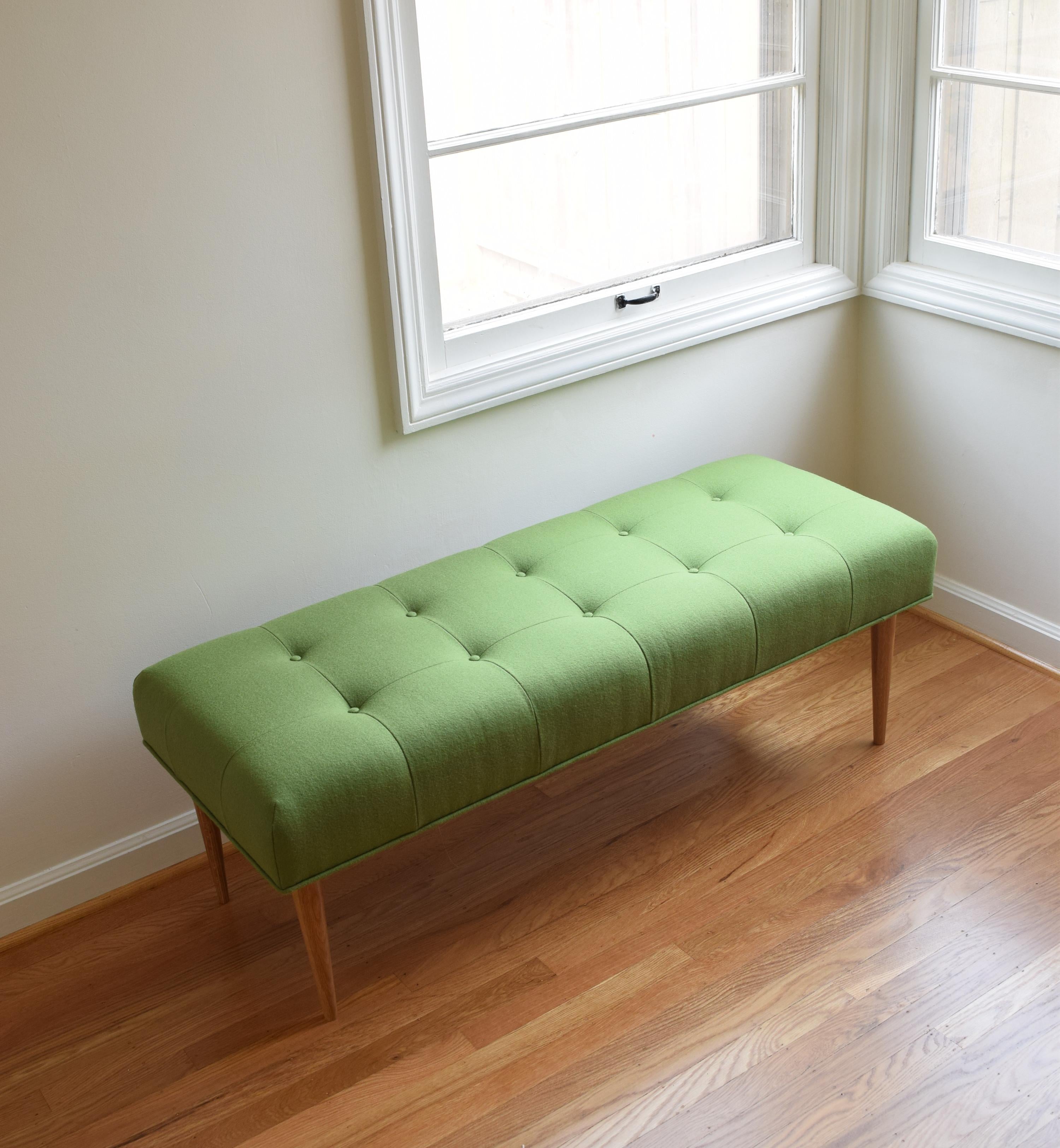 Made to be both durable and responsible, this bench is handmade with a hardwood frame of FSC certified poplar, corner blocks of reclaimed oak, webbing suspension of renewable jute, and premium high density foam cushioning for years of comfort. Shown