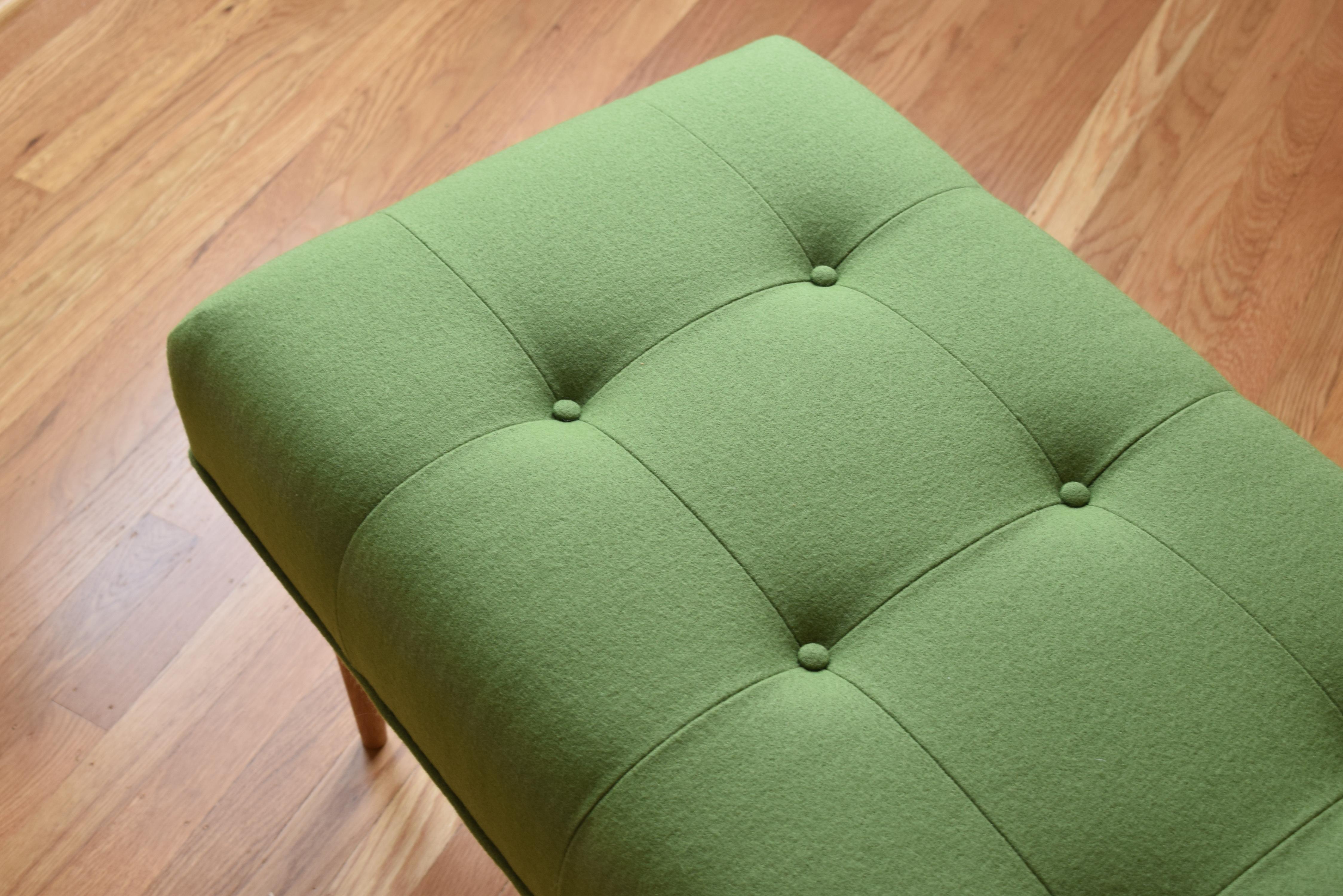 green tufted bench