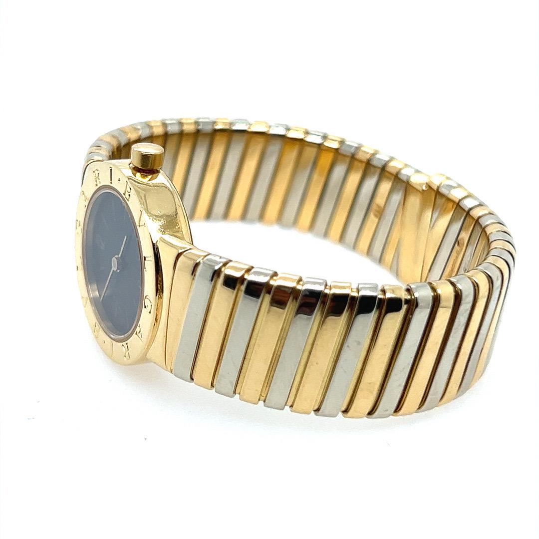 Modern BVLGARI White/Yellow Gold Tubogas Open Flex Cuff Quartz Lady 23mm Watch  In Good Condition For Sale In Los Angeles, CA