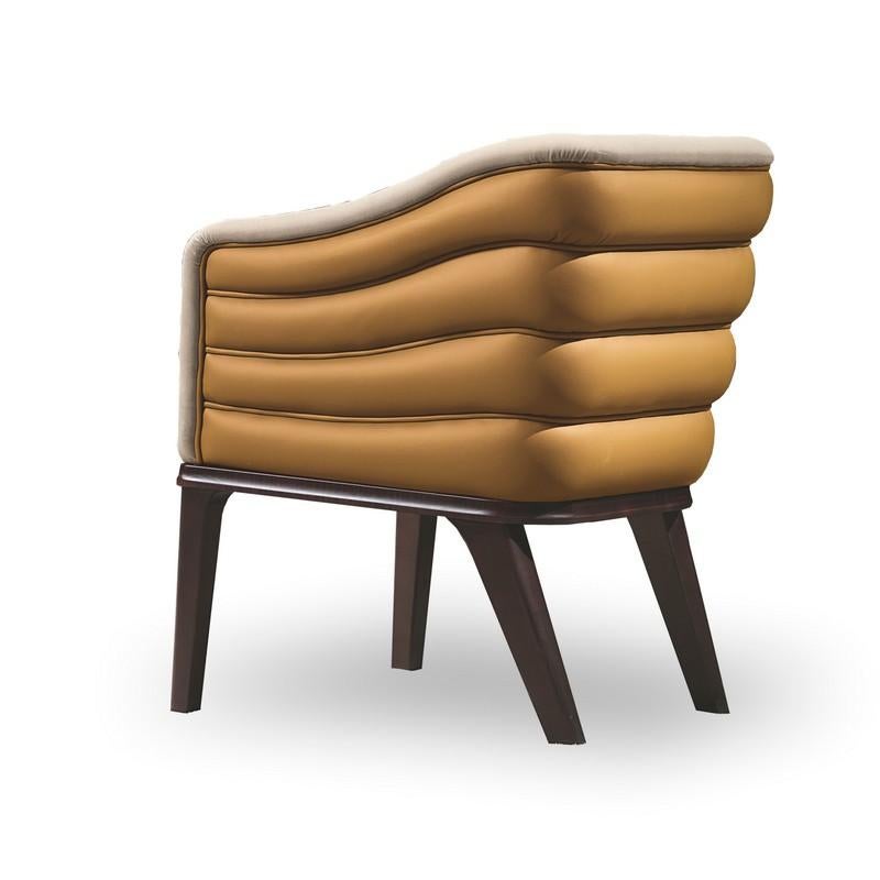 Armchair system with wooden structure covered with a layer of polyurethane. The maximum comfort of the seat is determined by an intertwining of elastic straps. Wooden feet in dark Sycomoro finish. The outer shell can be smooth (PO68), with vertical