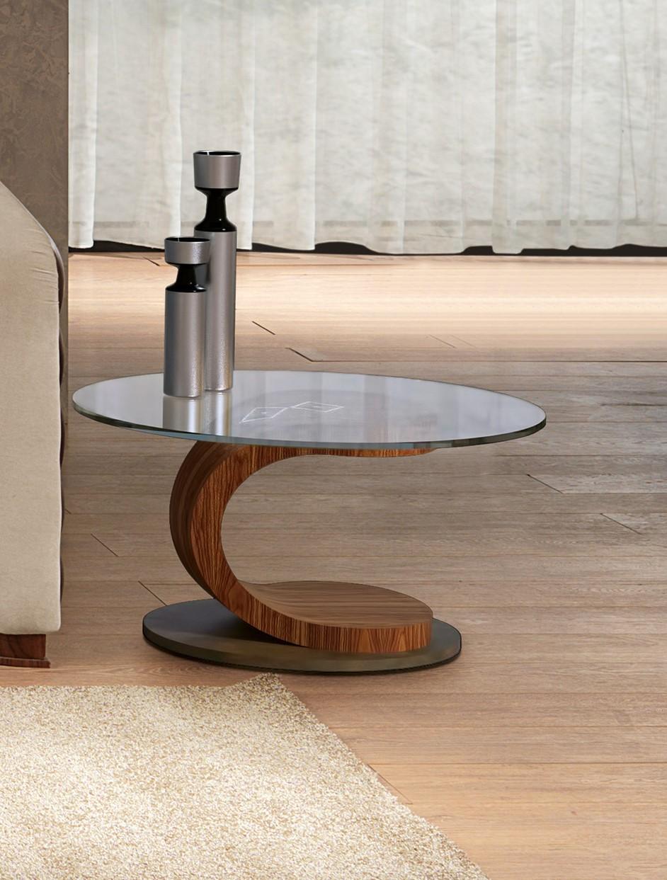 Coffee table in round shape with glass top. The structure is in Canaletta walnut. Base enriched by metal element.