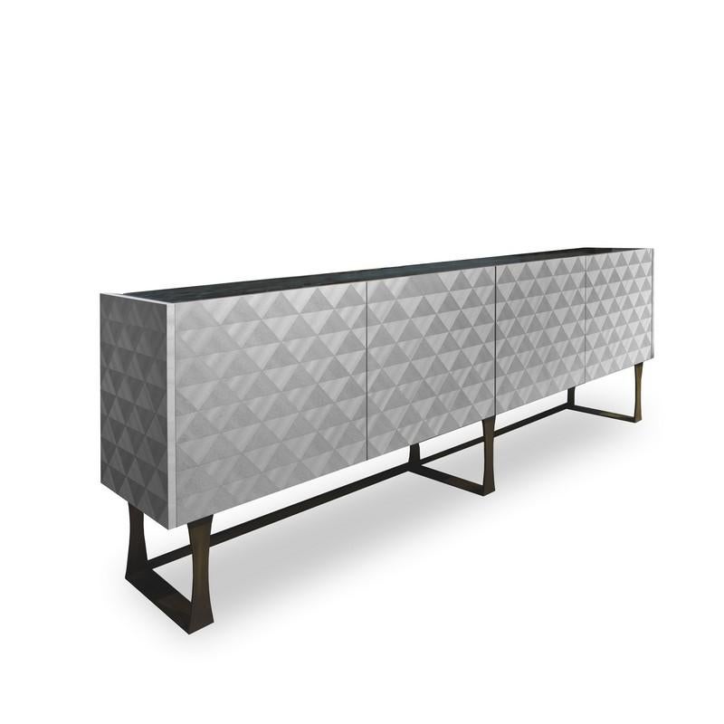 Sideboard with fronts enriched by geometrical inlay. Available in Pama wood or in Dark Sycomoro frisé wood. Recessed top available in black Marquinho marble or in varnished glass top. The feet are in metal, with satin bronzed finish.