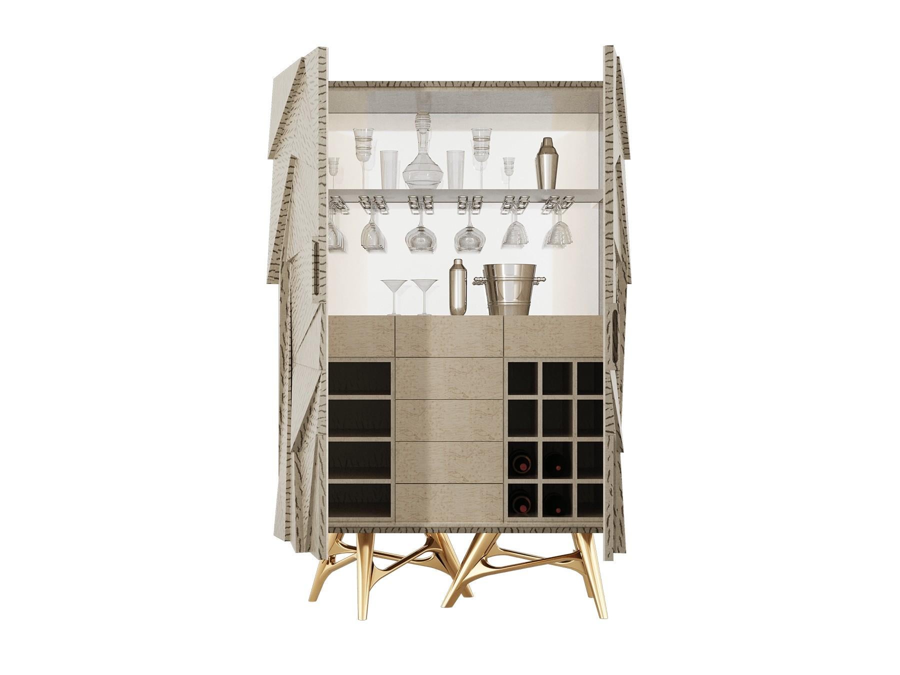 Rosalia Cabinet is an outstanding modern style design. This bar cabinet combines harmonious shapes and materials. An elegant theatrical shape to store your favorite drinks and be part of your high-end design project.

Materials: Body in Gloss Zebra