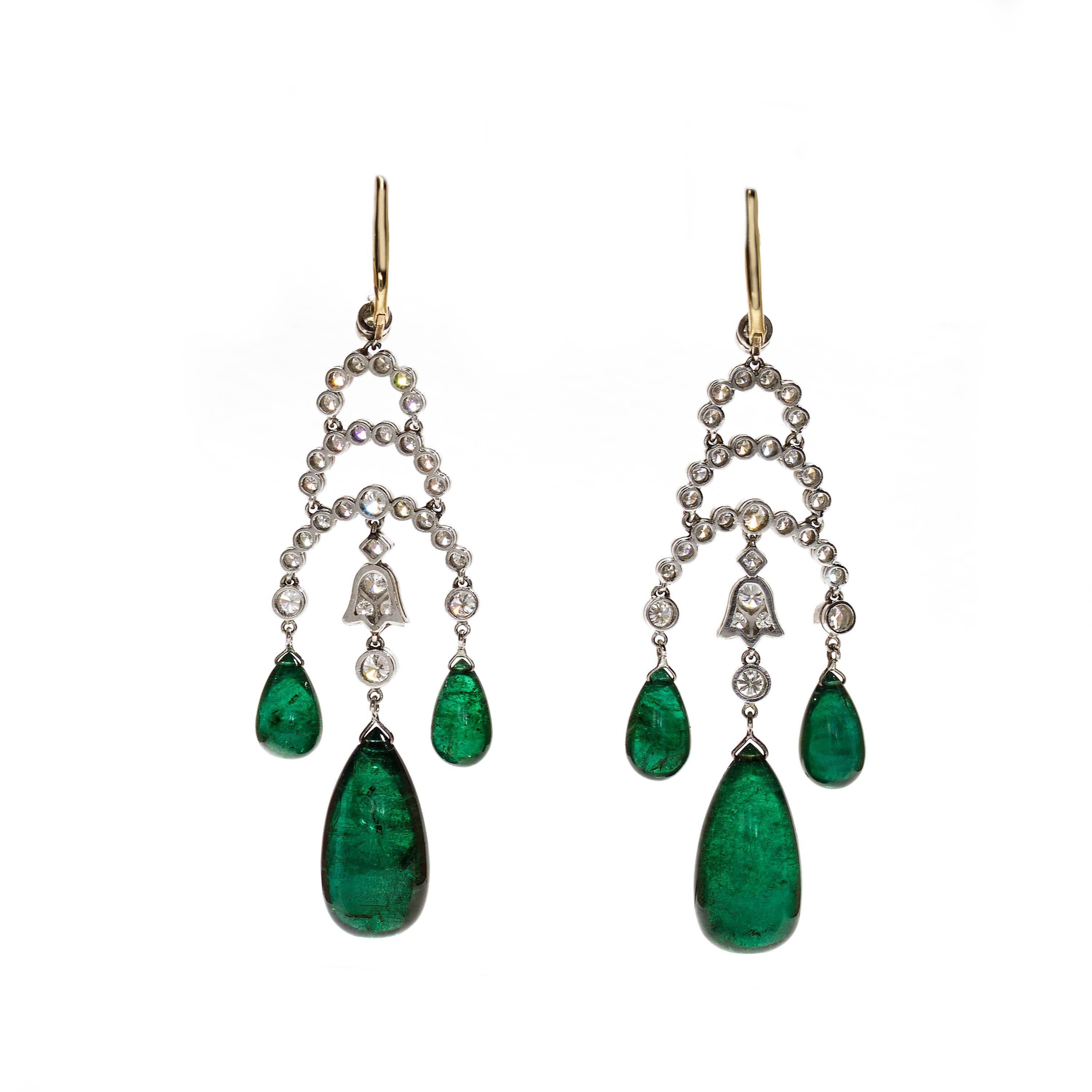 A pair of modern cabochon emerald and diamond drop earrings, with diamond set tops, with a total weight of approximately 4.50ct, with three curved rows of round brilliant-cut diamonds, in millegrain edged rub over settings, with a tulip shaped