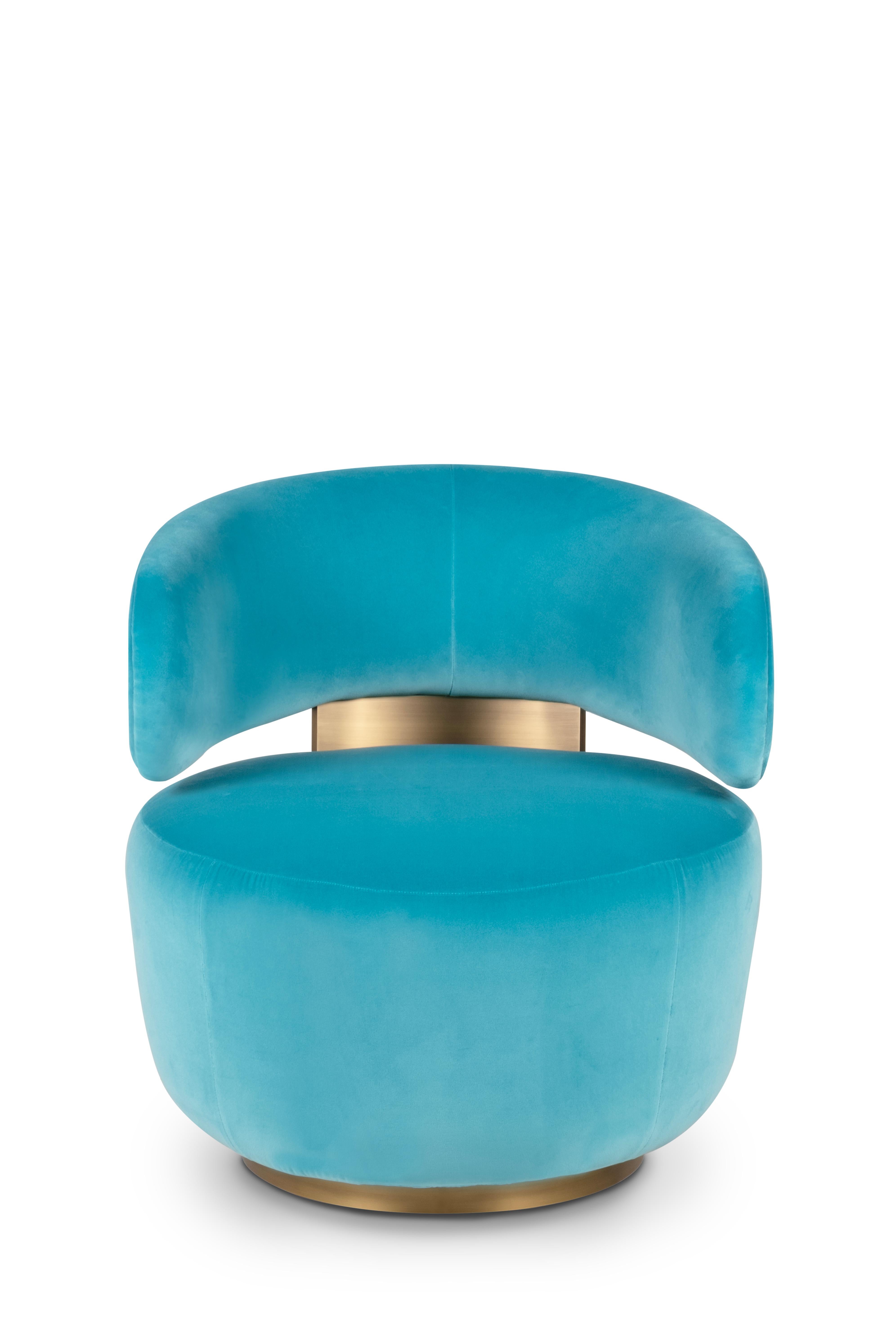 Caju Swivel Lounge Chair, Contemporary Collection, handgefertigt in Portugal - Europa von Greenapple.

Der Loungesessel Caju ist ein trendiges Möbelstück, das die organische Form einer Cashew verkörpert. Das Design des mit türkisfarbenem Samt
