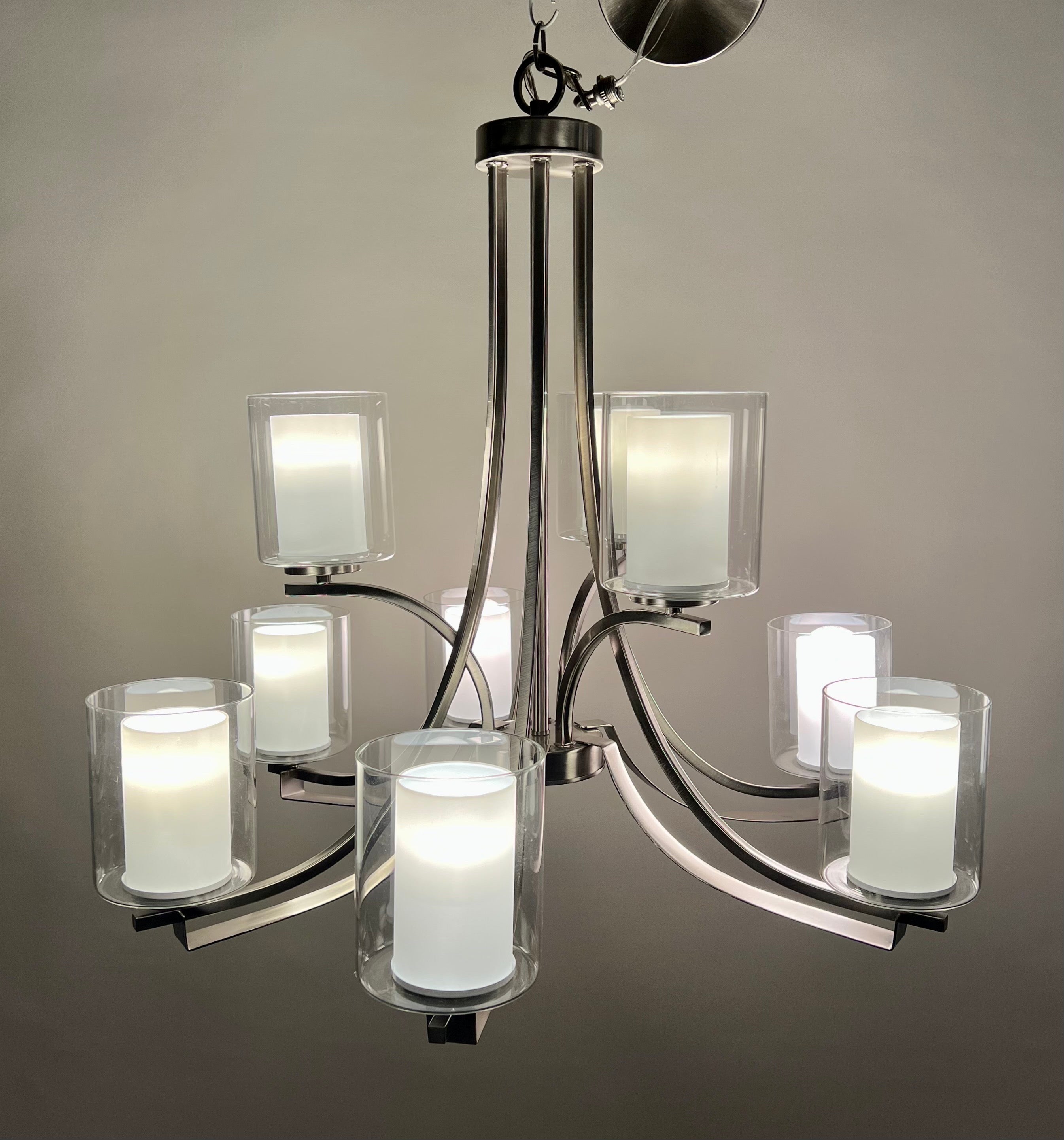  A Modern Candle Style Chrome Chandelier. With its nine radiant lights, this chandelier seamlessly combines clean, graceful lines with the timeless allure of chrome fixtures.
The defining features of this chandelier lie in the meticulously crafted