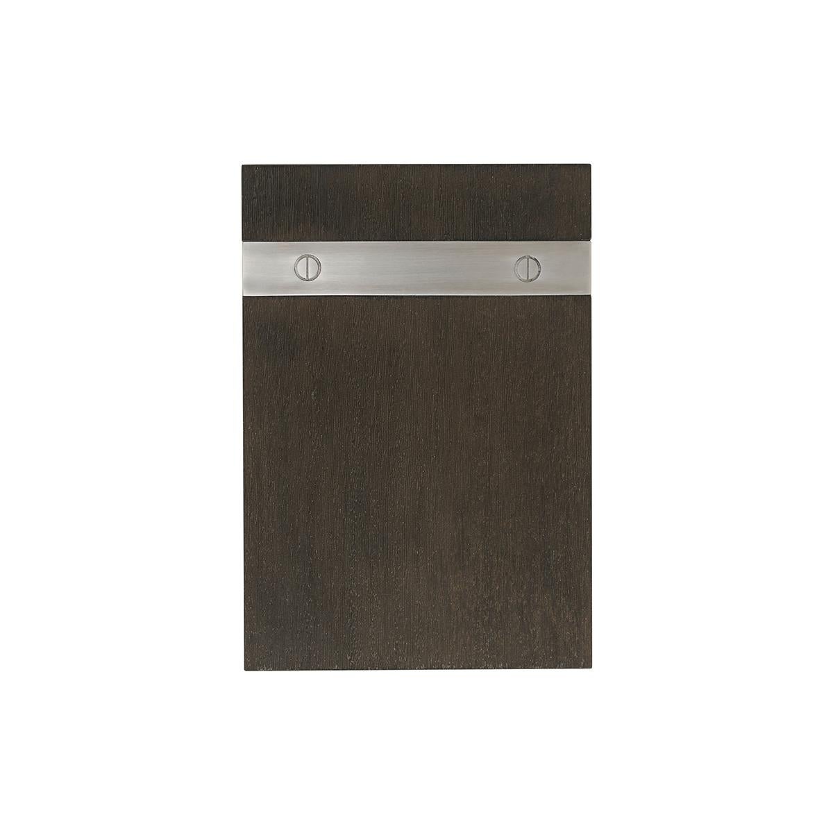 The simple modern cantilever design with a dark anise finish to the Lati veneered top, with a brushed nickel finish metal support and with industrial modern slot screw accents.

Dimensions: 10
