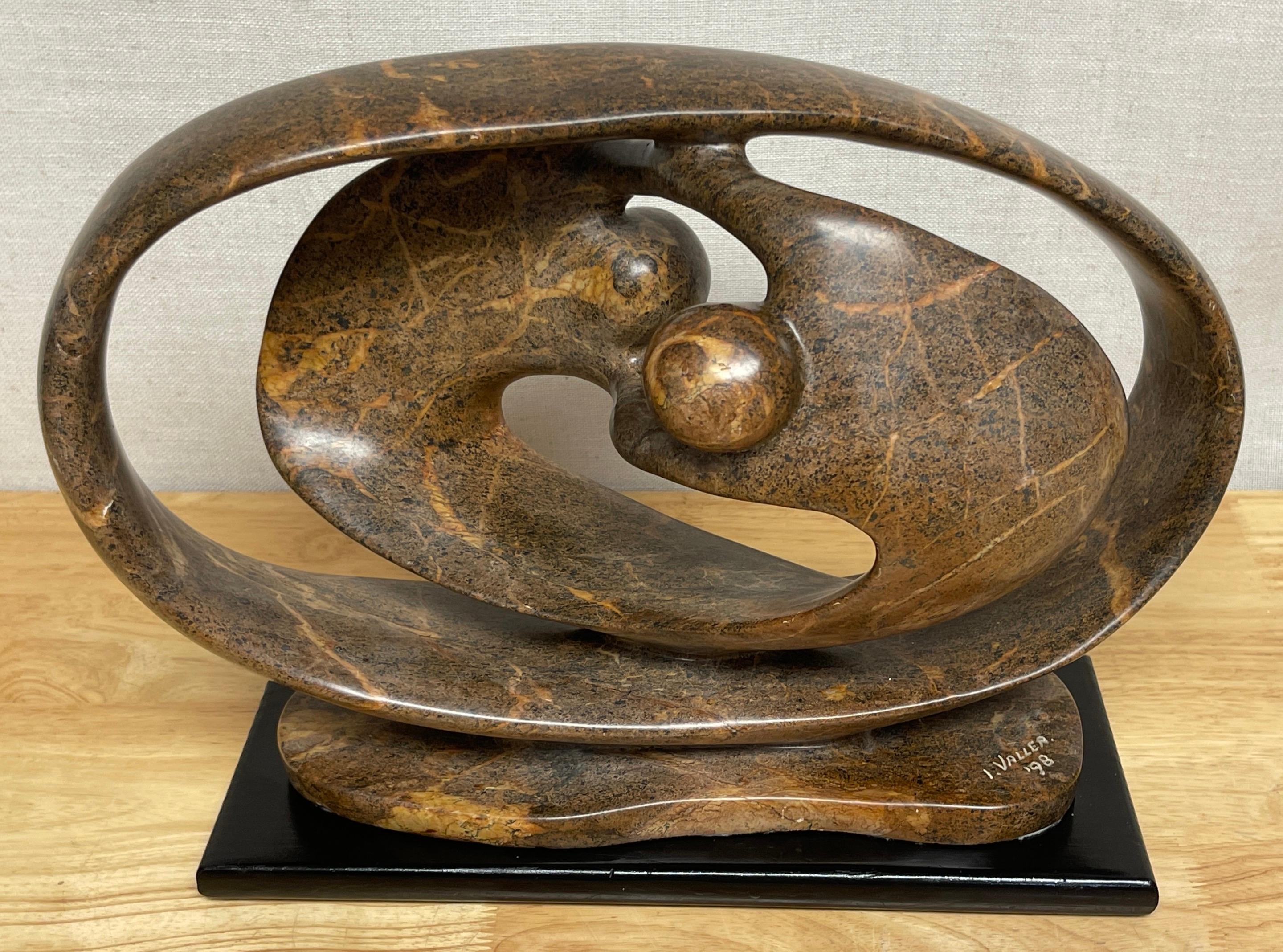 Modern Carved Marble Abstract-Biomorphic Sculpture Signed, I. Vallea '98
USA, signed & dated I. Vallea '98
A good size well executed work, in earth tone marble, of horizontal oval form a pierced Ying-Yang style abstract /biomorphic form, with