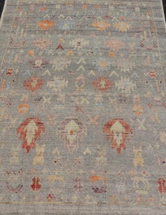 Modern Casual Afghan Tribal Designed Rug on a Light Gray Field