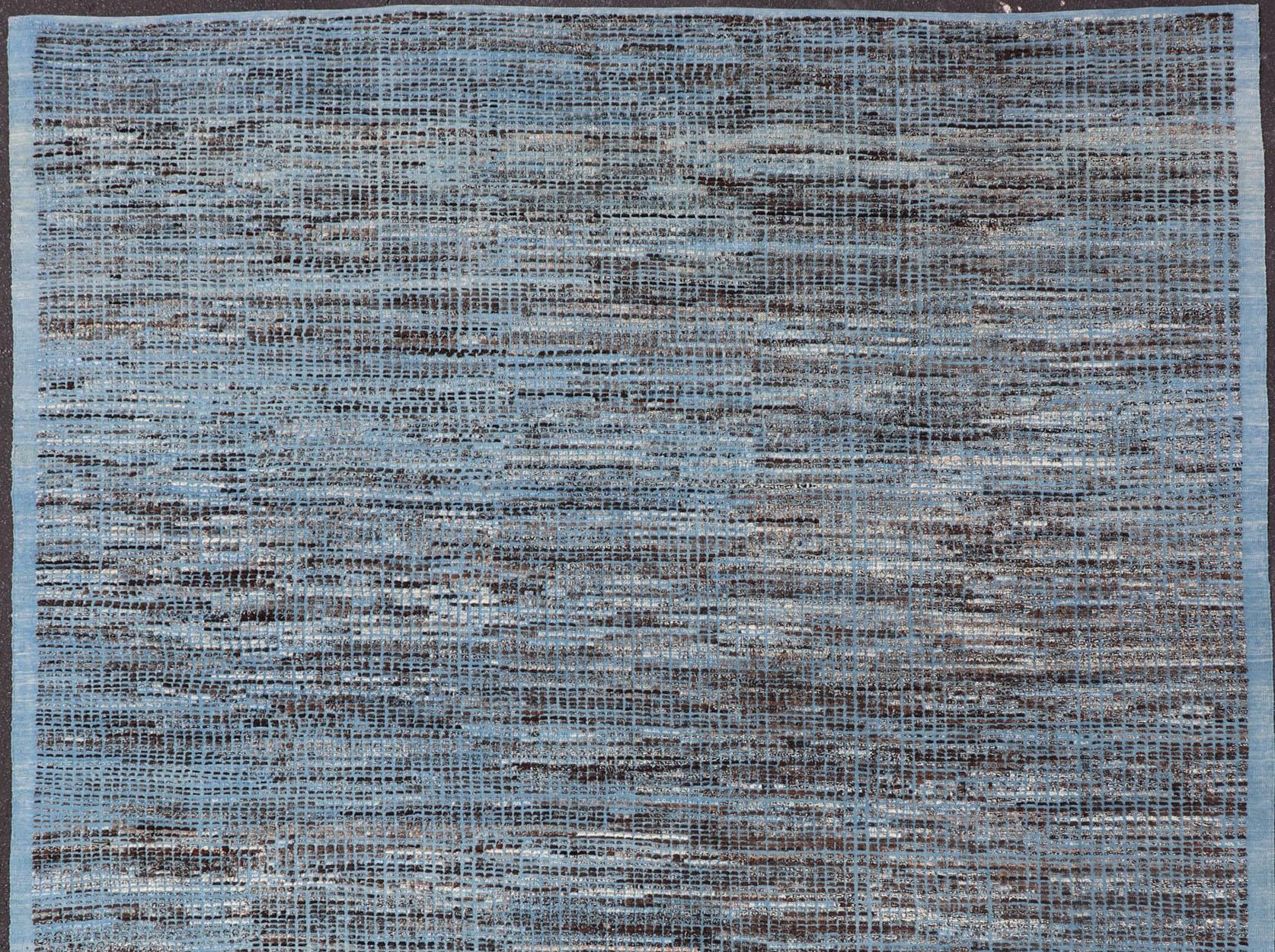 Afghanistan made rug in Various blues and charcoal colors in hi-low texture and free-flowing tribal design, Keivan Woven Arts / rug AFG-30452, country of origin / type: Afghanistan / Modern Casual

The modern casual design of this rug makes it