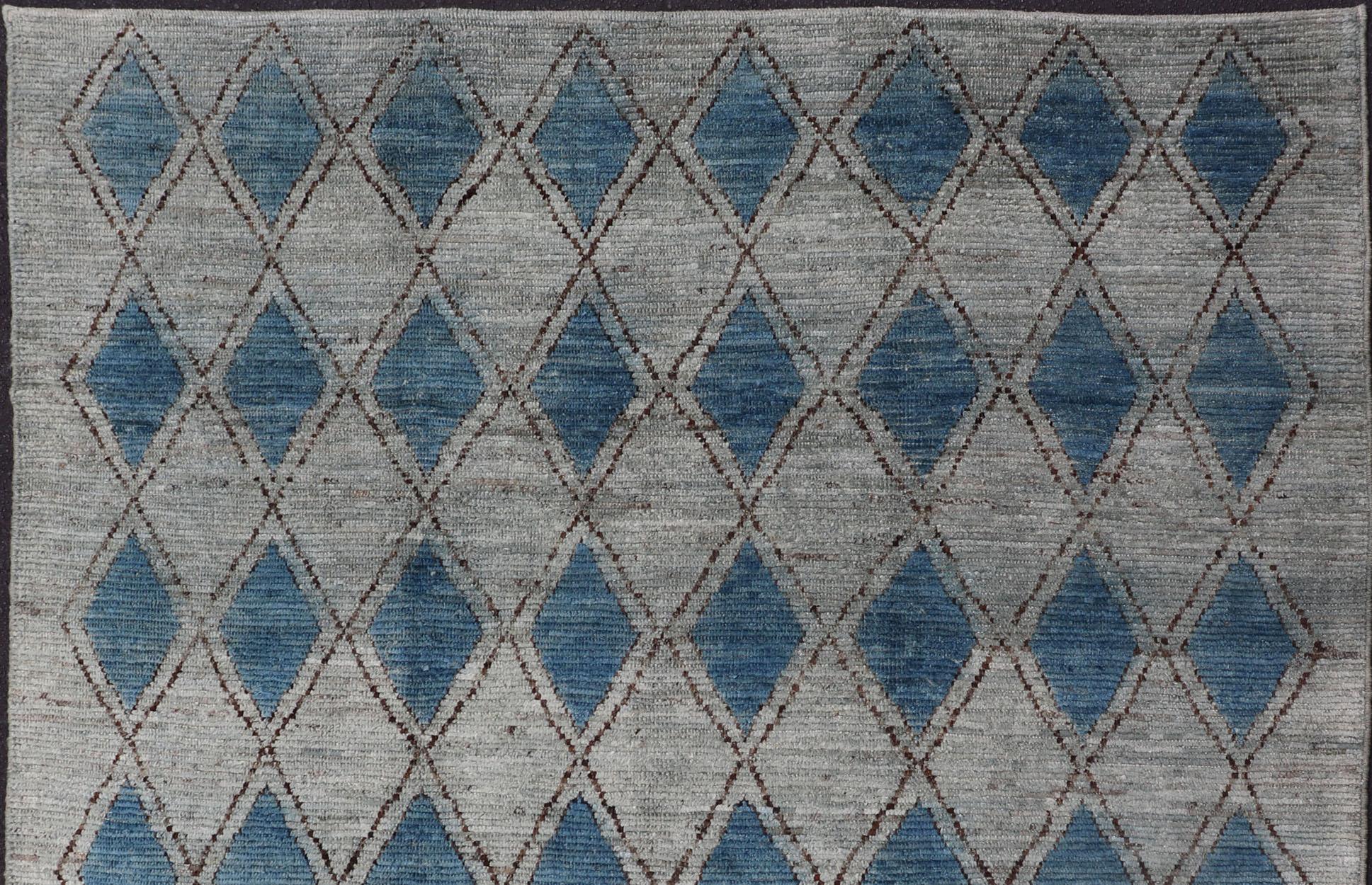 Blue, gray, and brown rug with modern casual design and natural wool, rug AFG-31952, country of origin / type: Afghanistan / Modern,

This classic natured Moroccan design rug represents modern casual look and features geometrical tribal motif
