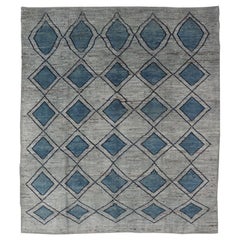 Tappeto tribale dal design moderno e casual con motivo a diamante in verde, blu e marrone