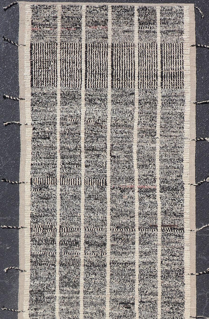Neutral-toned black and white variegated tribal design modern rug, Keivan Woven Arts/ rug AFG-36097, country of origin / type: Afghanistan / Modern, Modern Casual rug with tribal design in white and black colors

This Modern casual rug features a