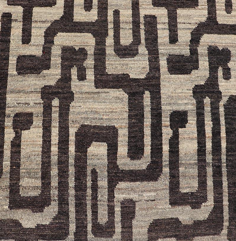 Modern Casual Runner in Wool with Black and Shades of Gray in Modern Design. Country of Origin: Afghanistan Type: Modern Casual Keivan Woven Arts; rug AFG-64769 / Design: Abstract, Sub-Geometric Key Words: Authentic Modern Casual.
Measures: 3'8 x